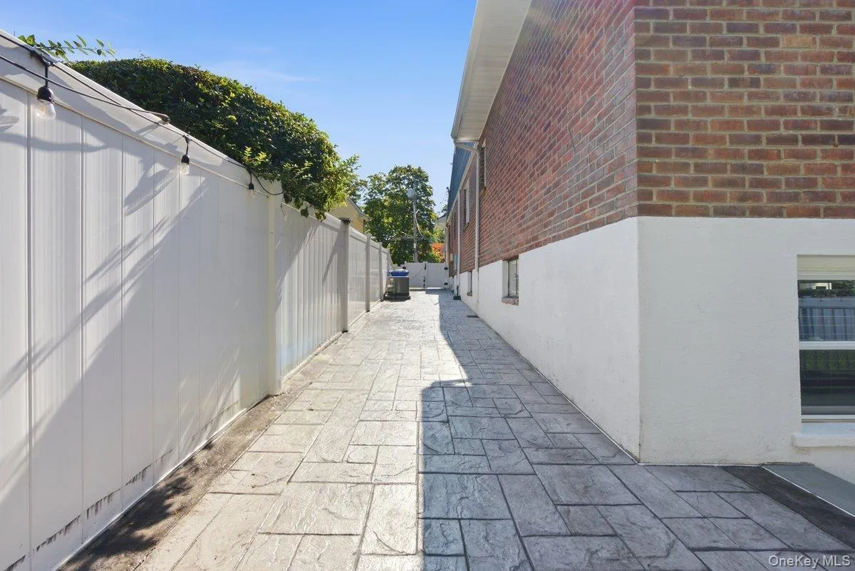 Patio walkway along the side of the Home Patio walkway along the side of the Home