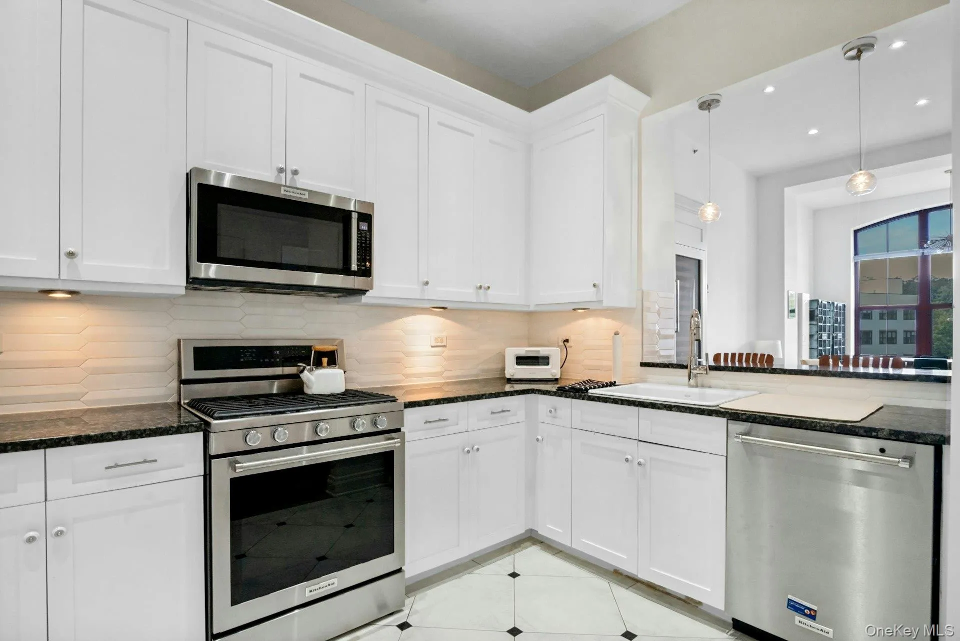 Spacious open kitchen with pass through area to LR/DR Spacious open kitchen with pass through area to LR/DR