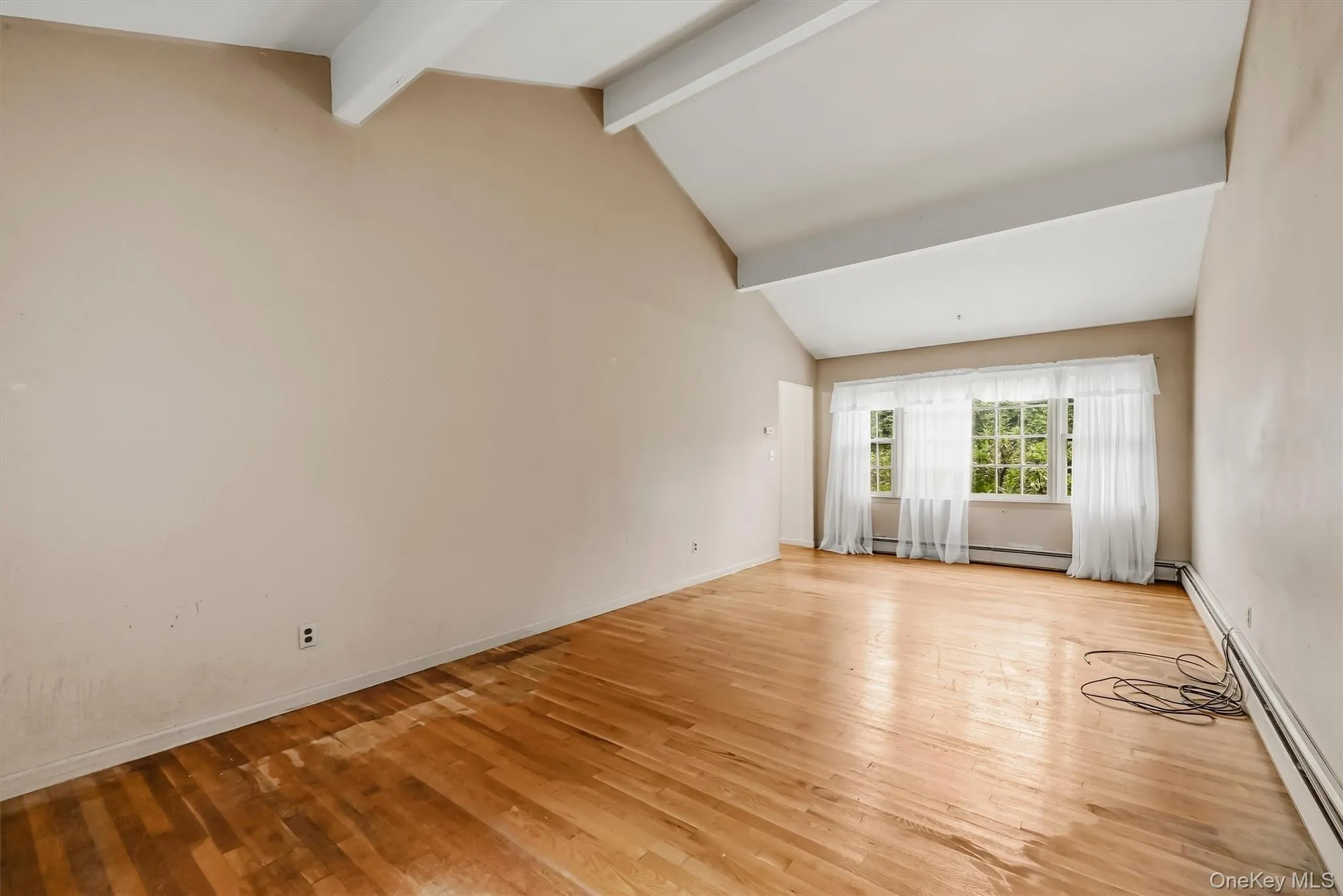 Hardwood floors and oversized windows for plenty of sunshine. Hardwood floors and oversized windows for plenty of sunshine.