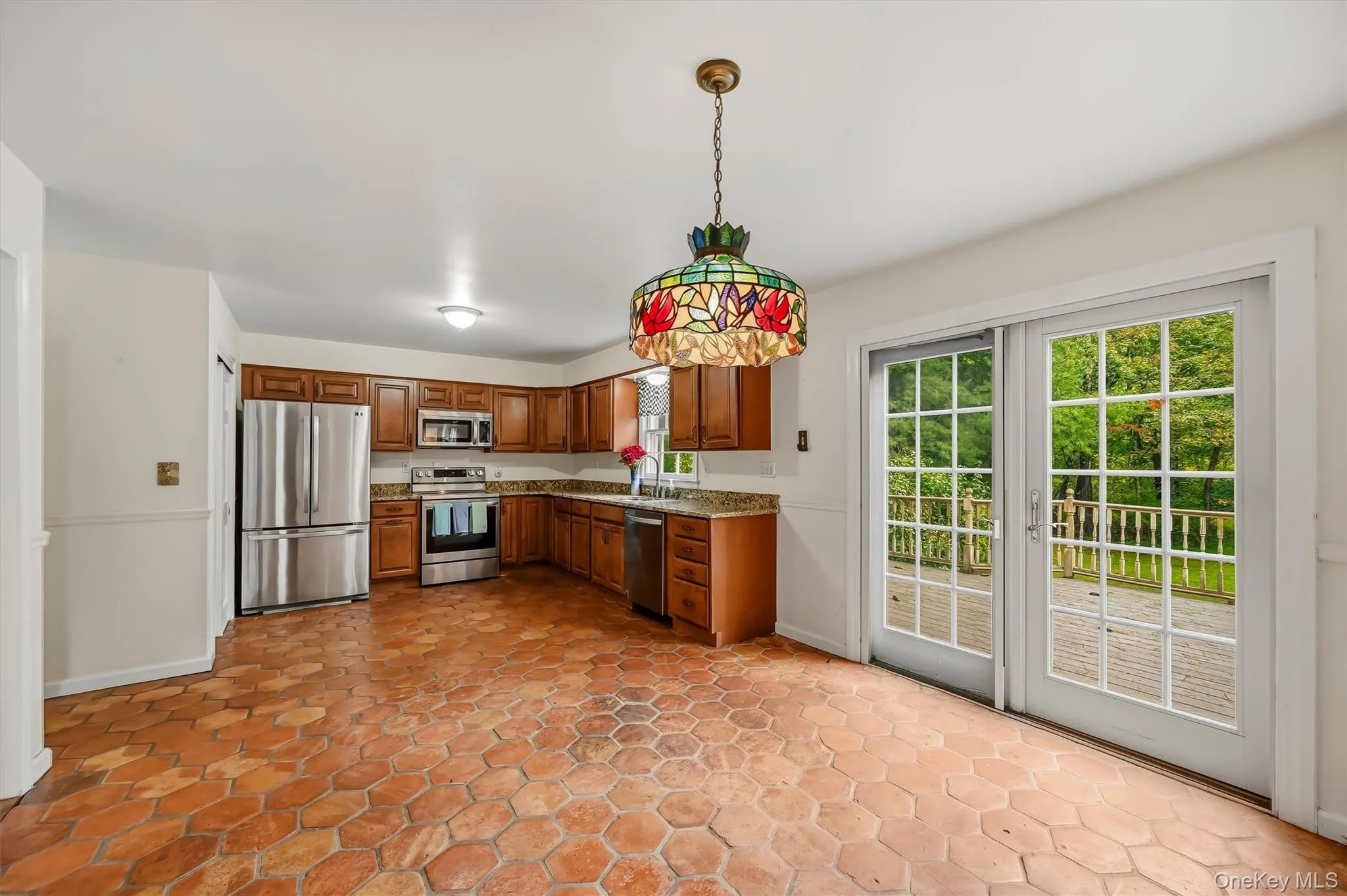 French doors lead to the large composite deck. French doors lead to the large composite deck.
