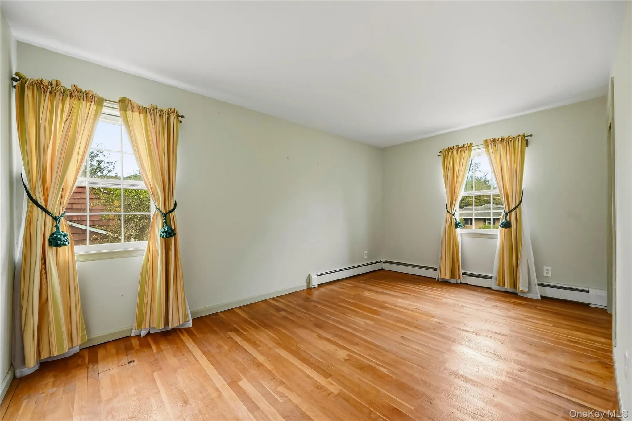 Bedroom #2 features hardwood floors and double windows Bedroom #2 features hardwood floors and double windows
