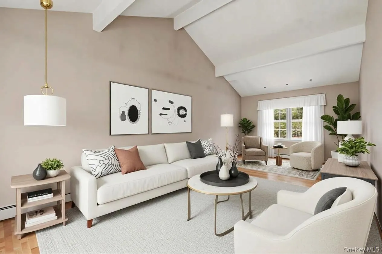 This living room can accommodate numerous seating areas. Virtually staged This living room can accommodate numerous seating areas. Virtually staged