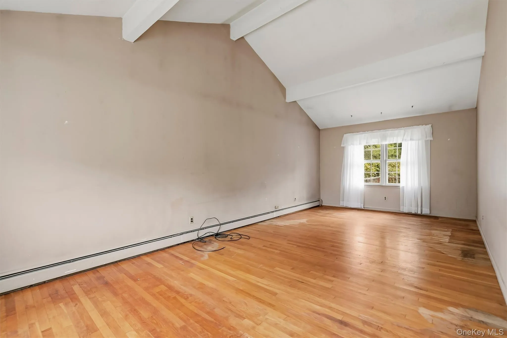 The living room is the full width of the home. The living room is the full width of the home.