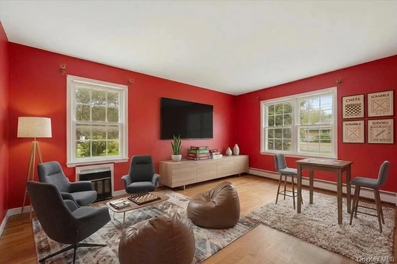 Virtually staged to show the spaciousness of the family room. Virtually staged to show the spaciousness of the family room.