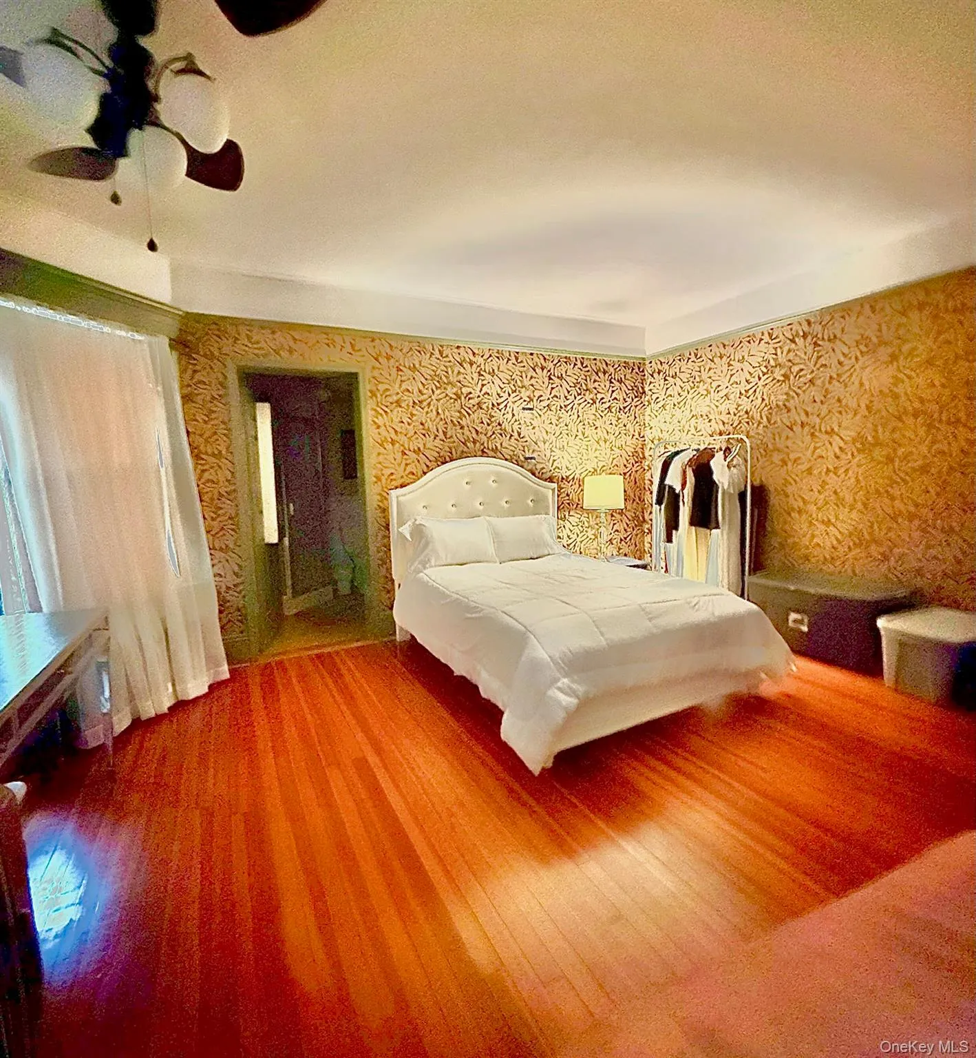 Main House Upstairs Bedroom Hardwood flooring, painted walls with decorative border, white trim Main House Upstairs Bedroom Hardwood flooring, painted walls with decorative border, white trim