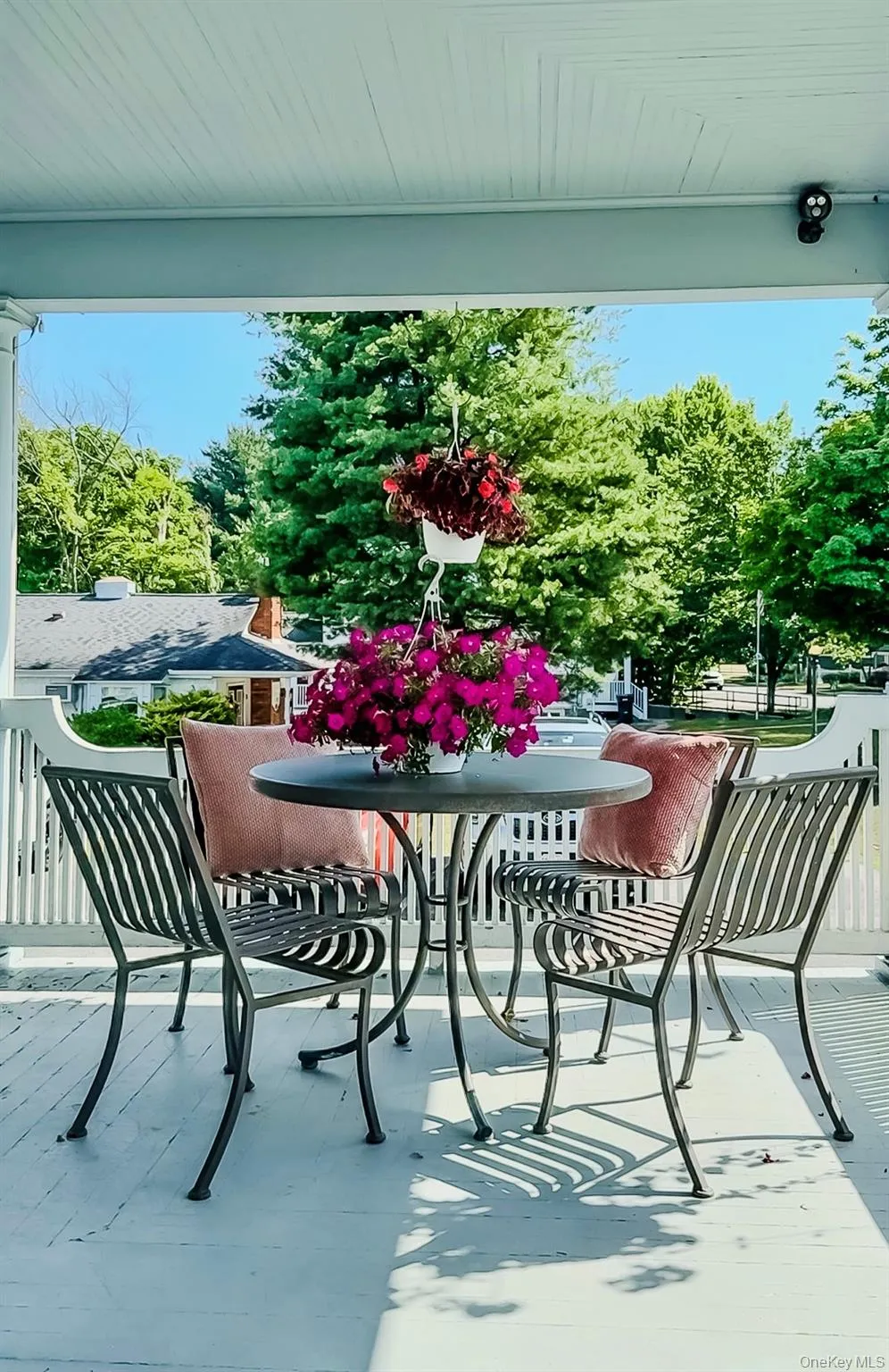 A wide covered porch and part of Outside Living Spaces A wide covered porch and part of Outside Living Spaces
