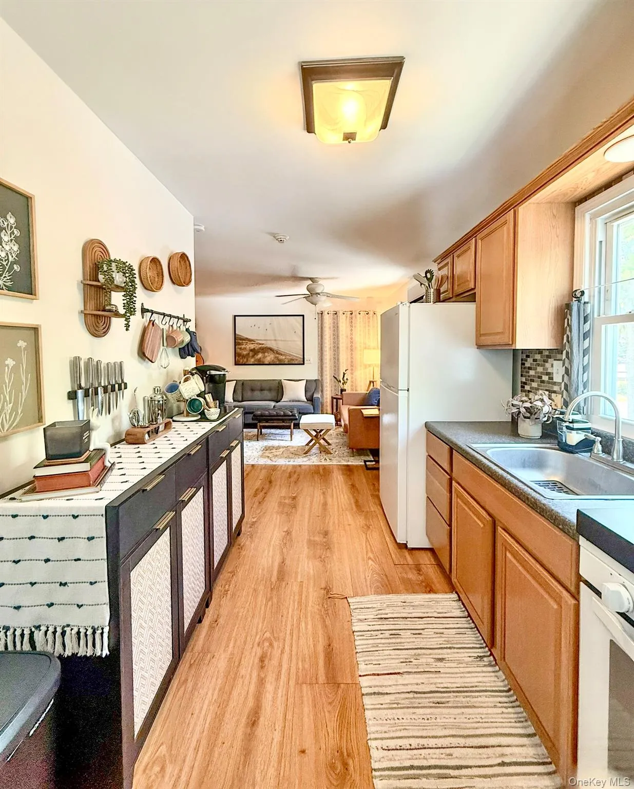 Upper Apartment Galley Kitchen with wood flooring Upper Apartment Galley Kitchen with wood flooring