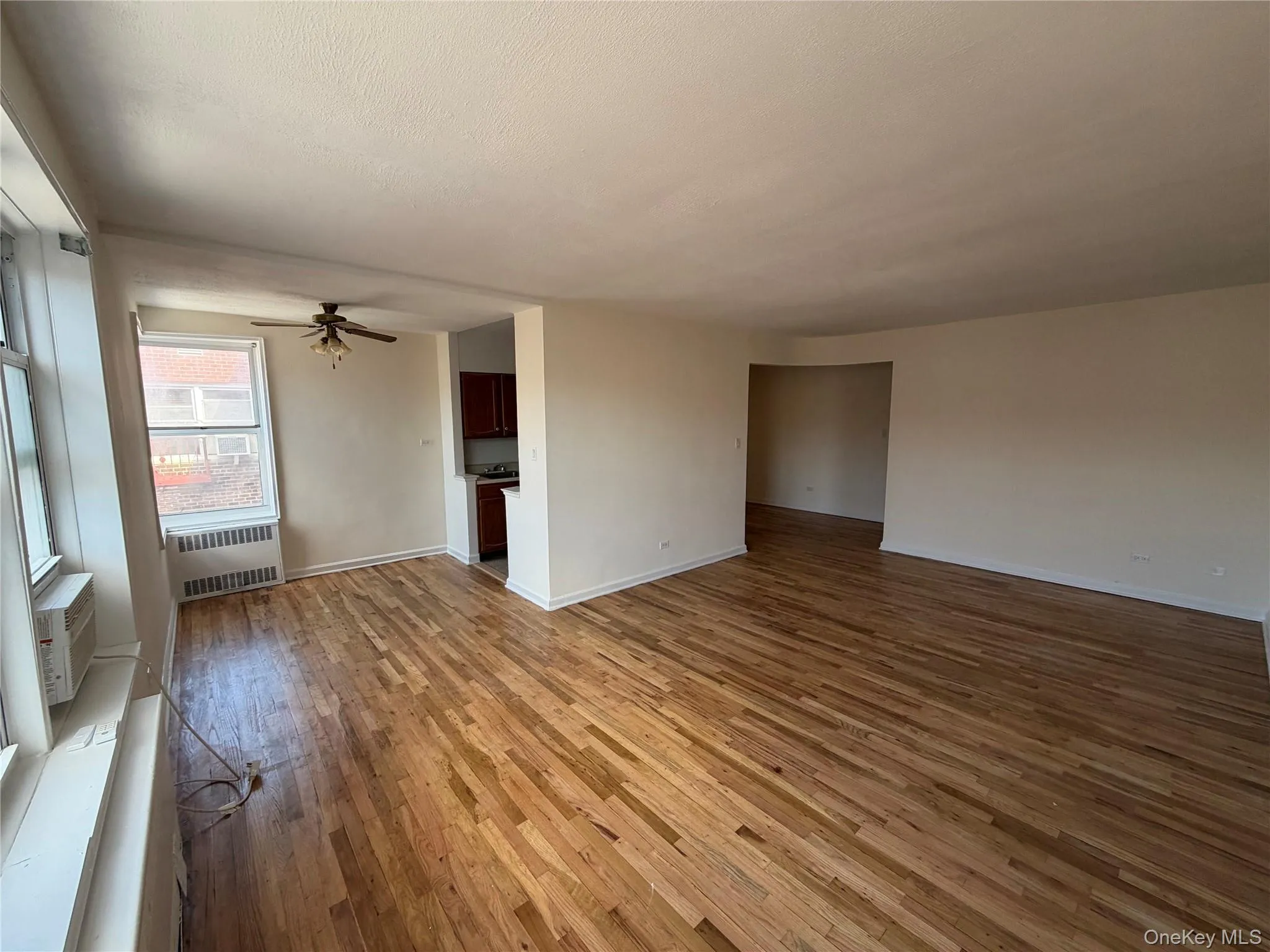 Living Room looking into sleeping alcove & kitchen to the right. Living Room looking into sleeping alcove & kitchen to the right.