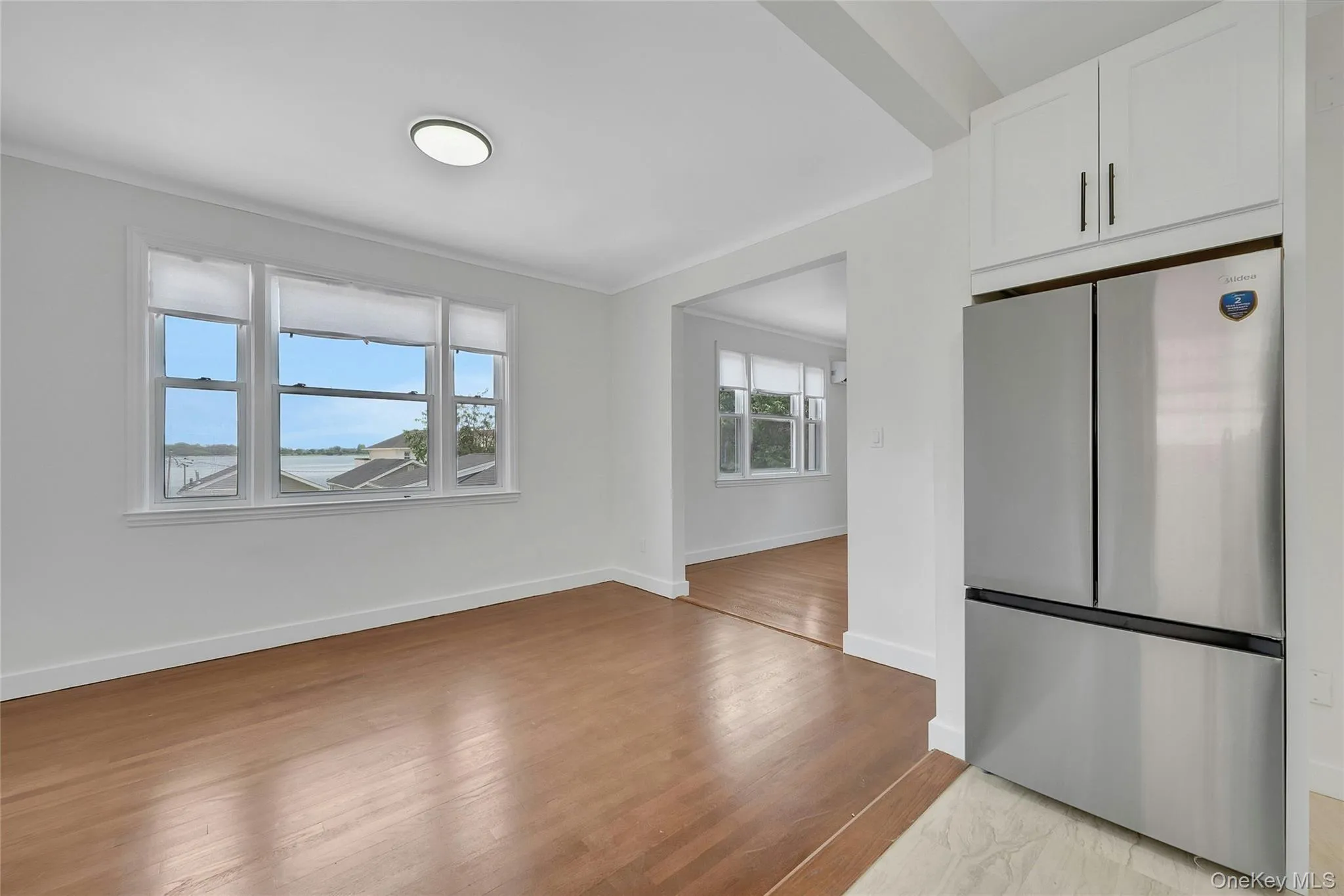 Dining room with incredible water views. Opens to new kitchen with all stainless appliances. Dining room with incredible water views. Opens to new kitchen with all stainless appliances.