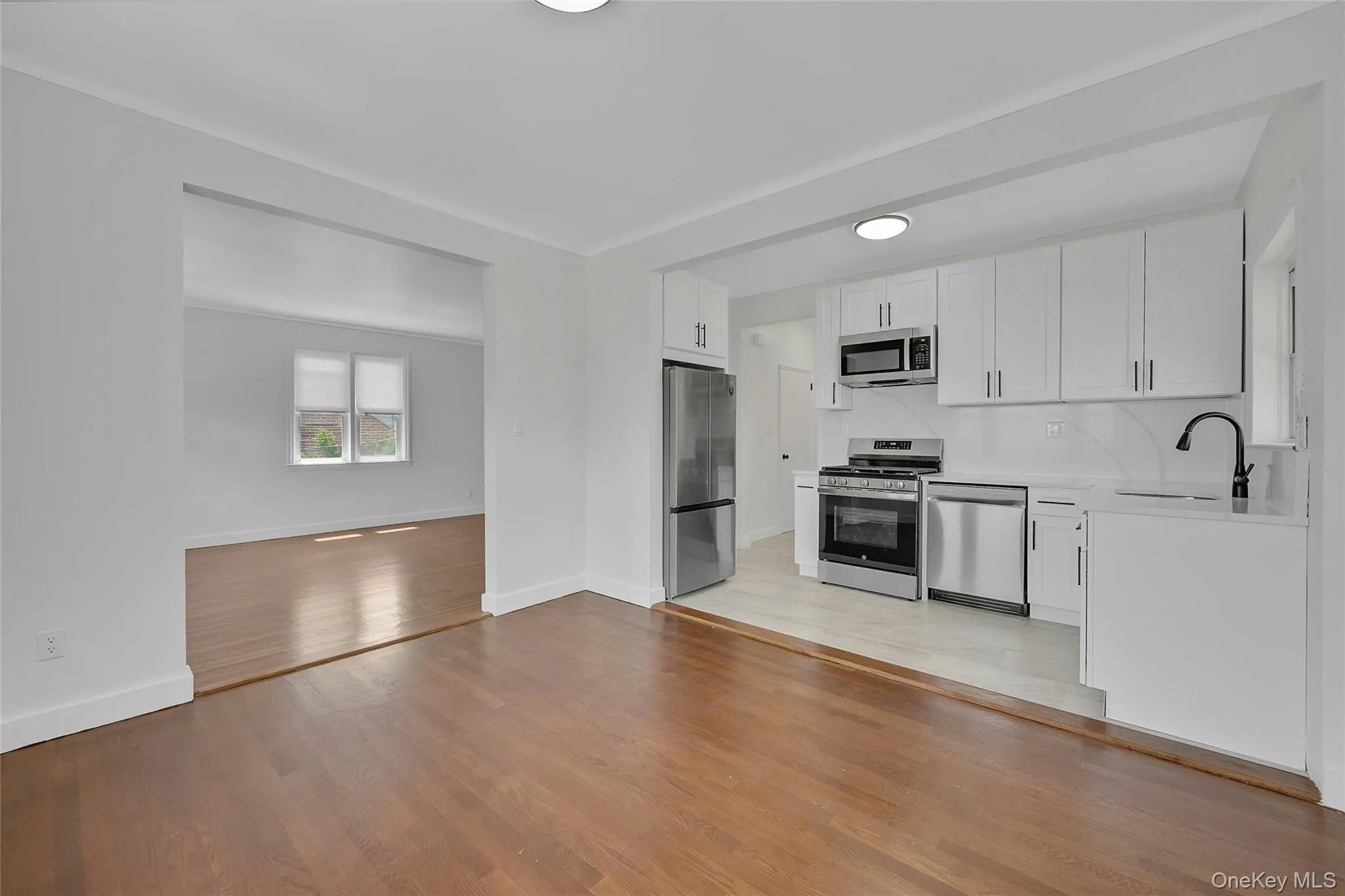 Open layout. Living room opens to dining area and kitchen. Everything is renovated and new! Open layout. Living room opens to dining area and kitchen. Everything is renovated and new!
