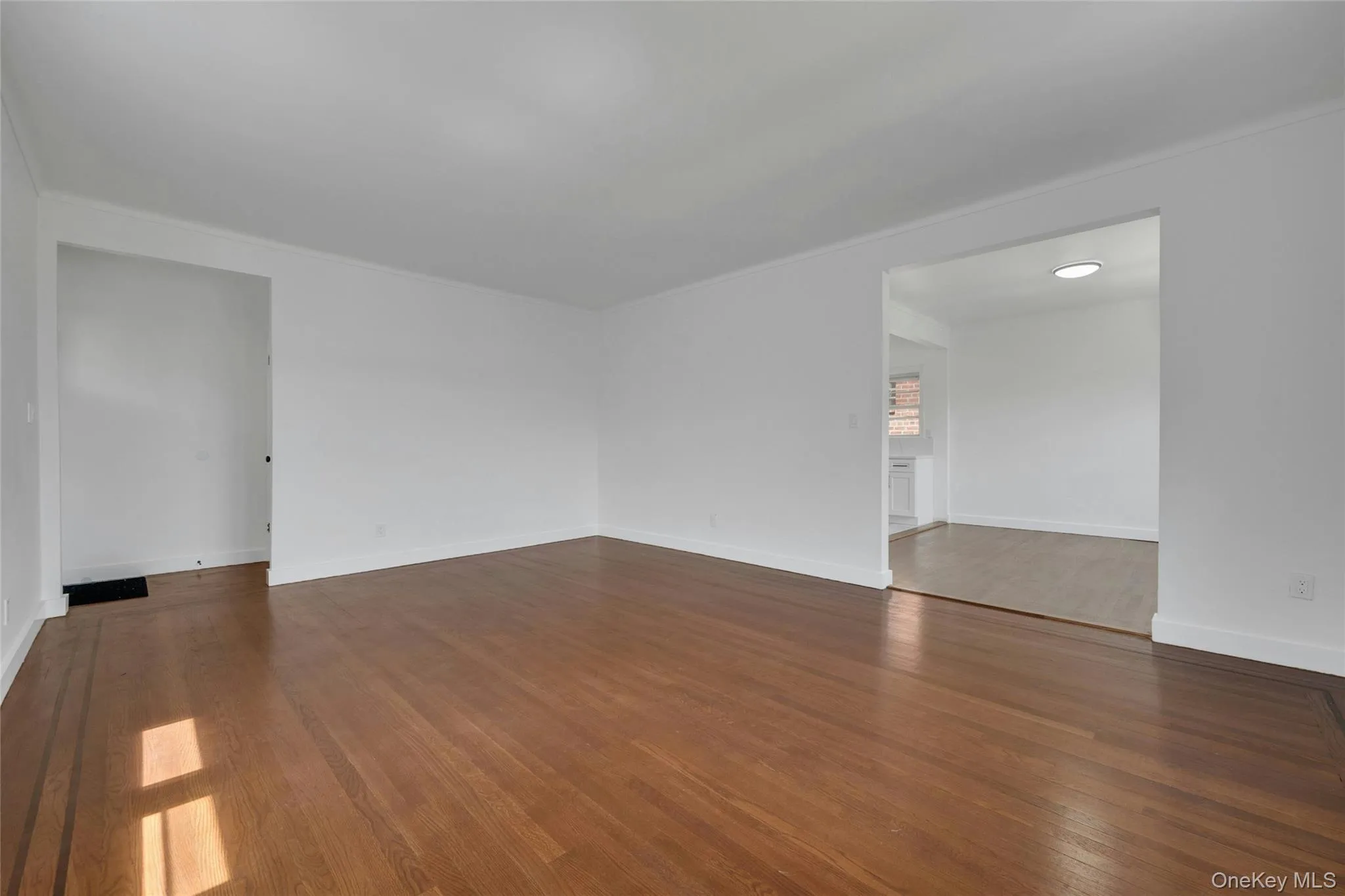 Great flow from the living room to the dining room and kitchen. Beautiful woodfloors throughout. New split central a/c unit(s) Great flow from the living room to the dining room and kitchen. Beautiful woodfloors throughout. New split central a/c unit(s)