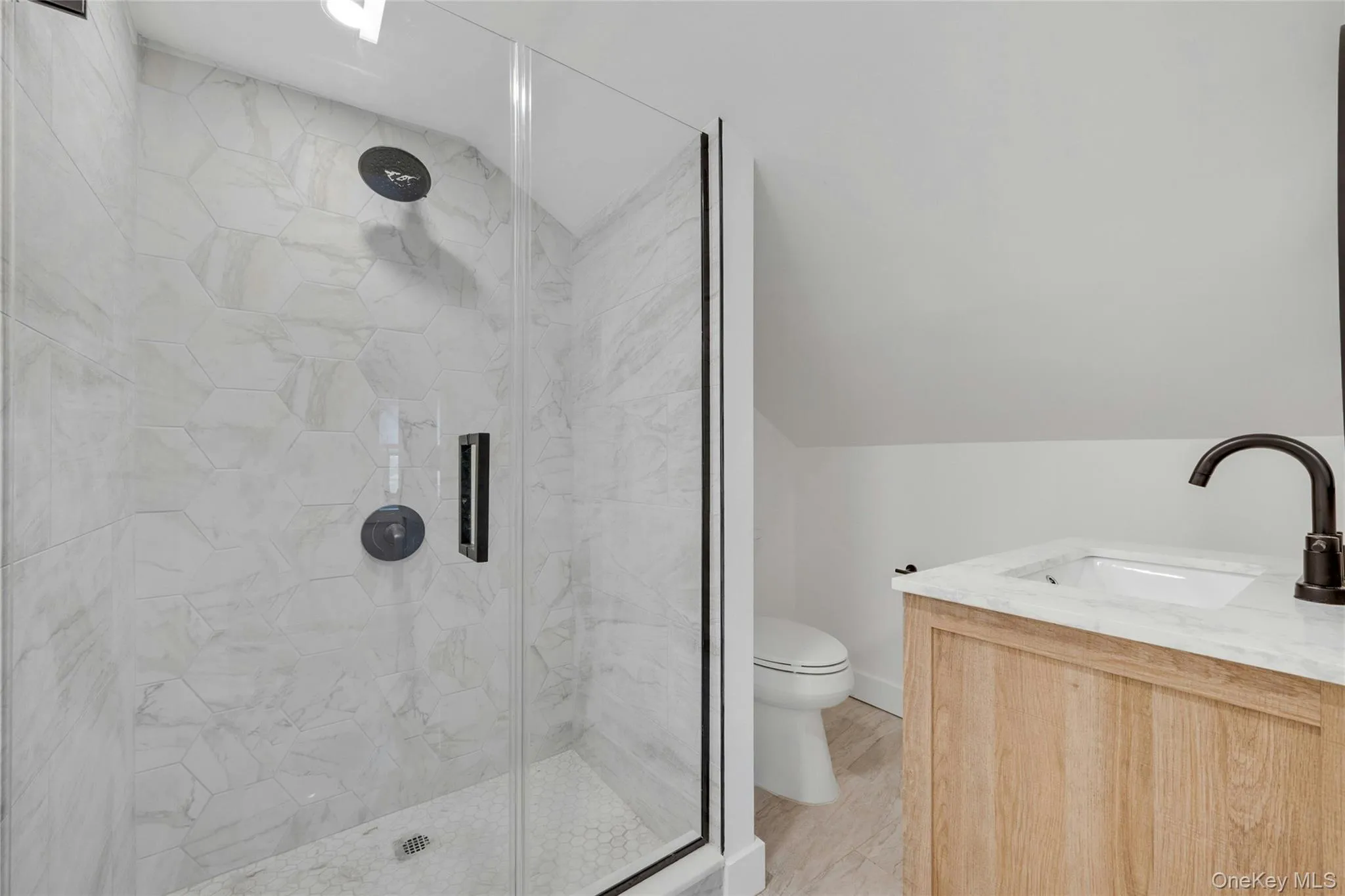 Totally new renovated full ensuite bathroom upstairs in the primary. Totally new renovated full ensuite bathroom upstairs in the primary.
