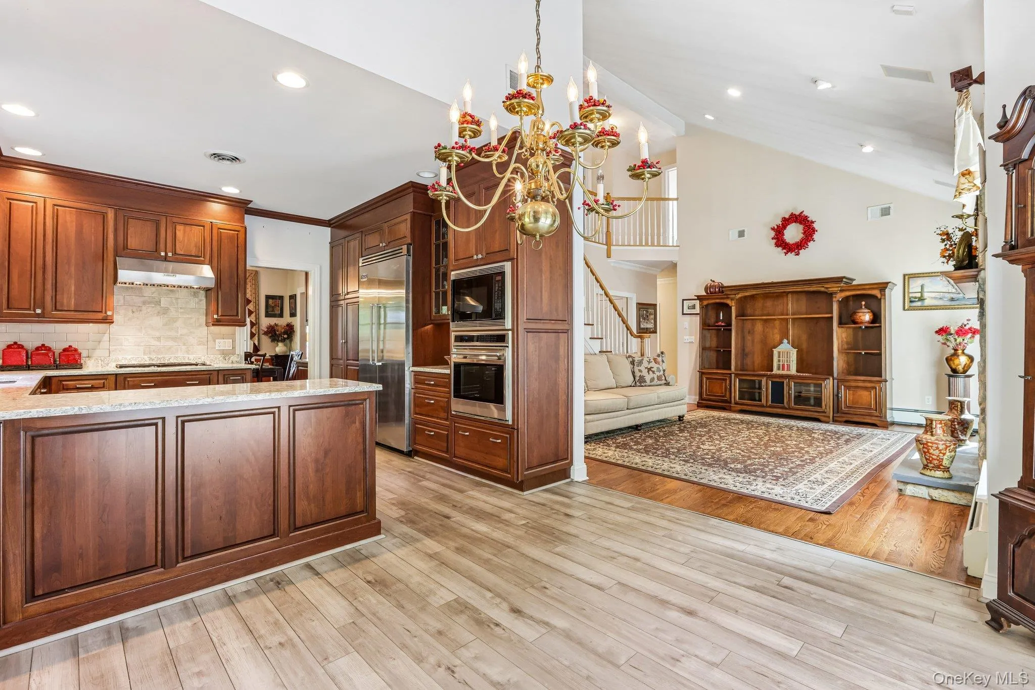 Hardwood flooring and light wood-finish flooring complement the extensive wood cabinetry Hardwood flooring and light wood-finish flooring complement the extensive wood cabinetry