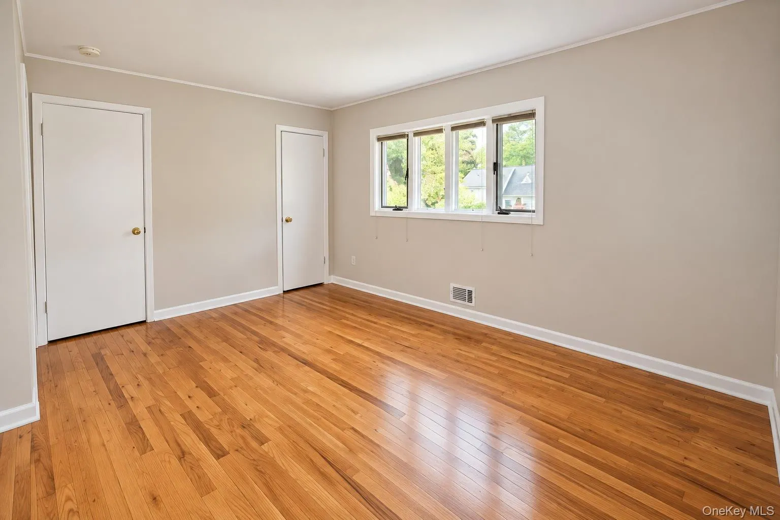 Primary bedroom with his & Hers closets. Primary bedroom with his & Hers closets.