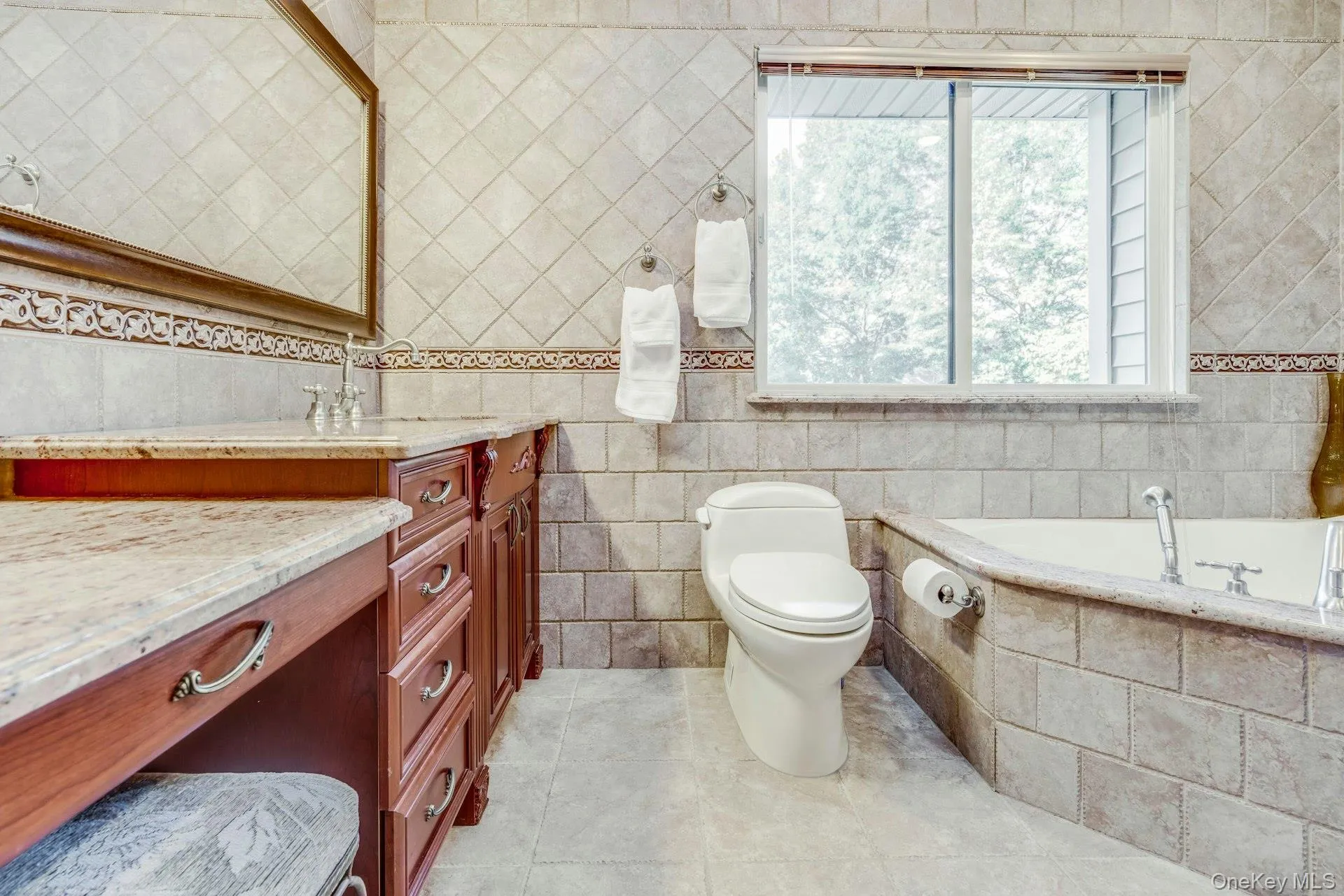Jetted tub, walk in shower, granite vanity Jetted tub, walk in shower, granite vanity