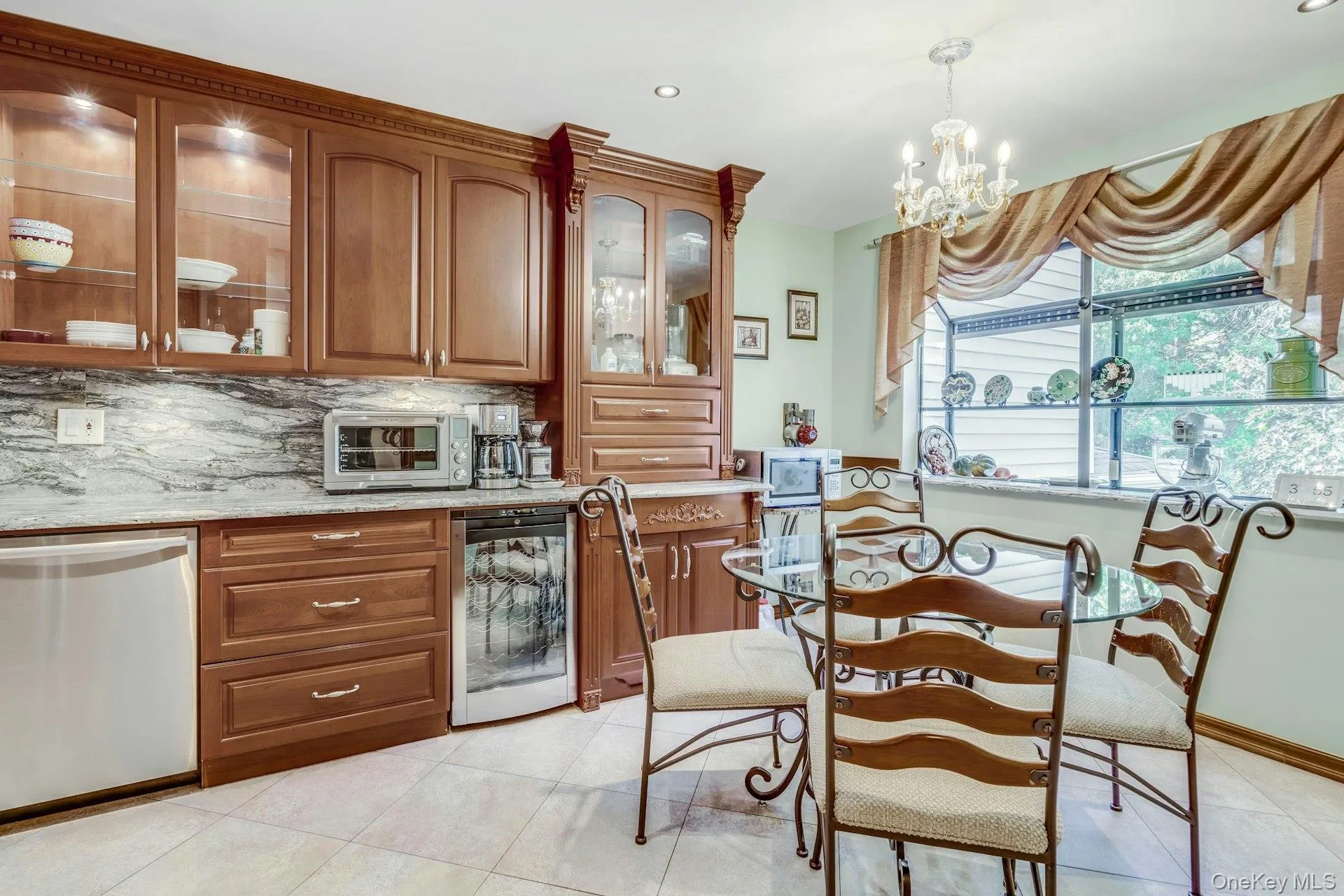 SS Bosch double oven, dishwasher and cooktop, vented hood, GE profile wine refrigerator and kitchenaide double door frig SS Bosch double oven, dishwasher and cooktop, vented hood, GE profile wine refrigerator and kitchenaide double door frig