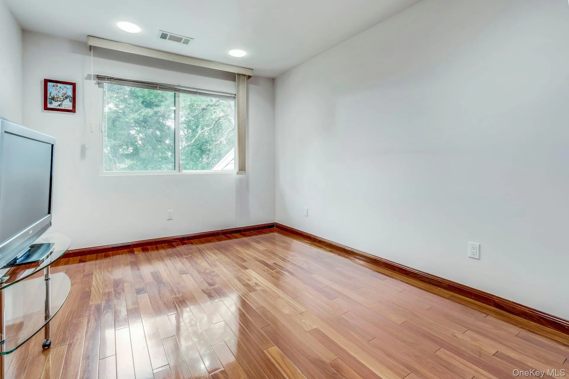 Bedroom with wood floors Bedroom with wood floors