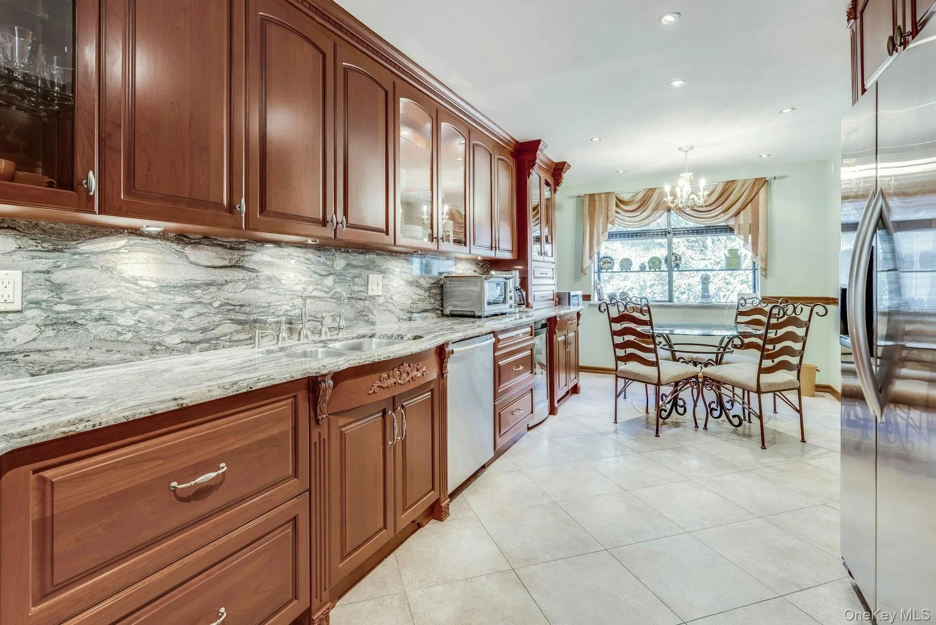 Top of the line Eat in kitchen with granite counters and backsplash, European designed cabinets with soft close Top of the line Eat in kitchen with granite counters and backsplash, European designed cabinets with soft close
