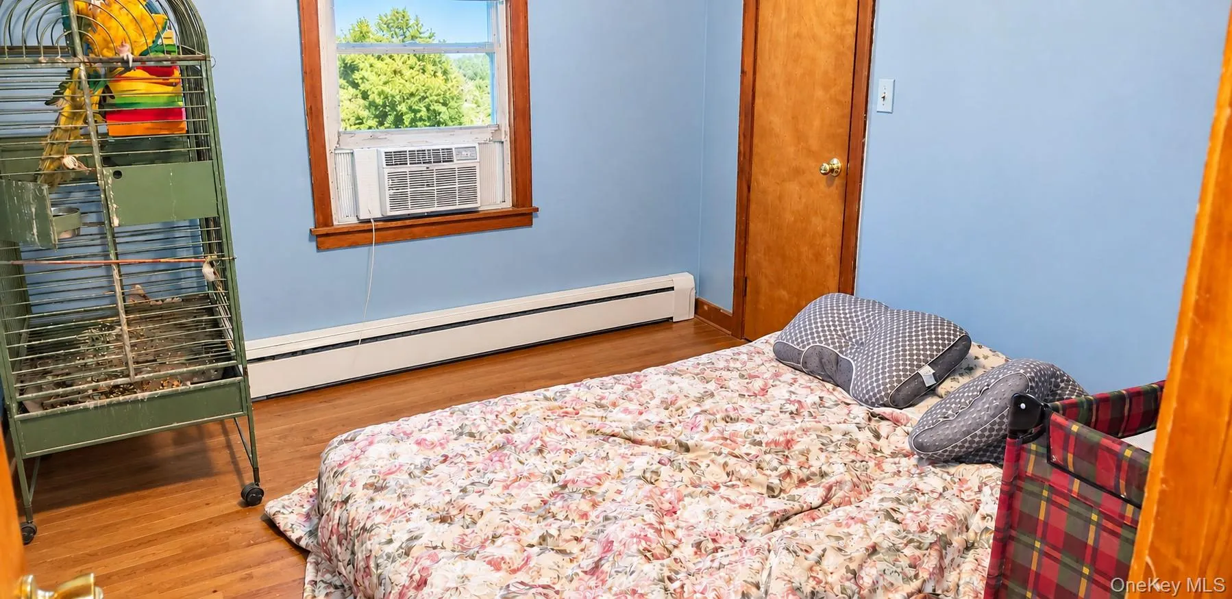 Wood-finish flooring with baseboard heating Wood-finish flooring with baseboard heating
