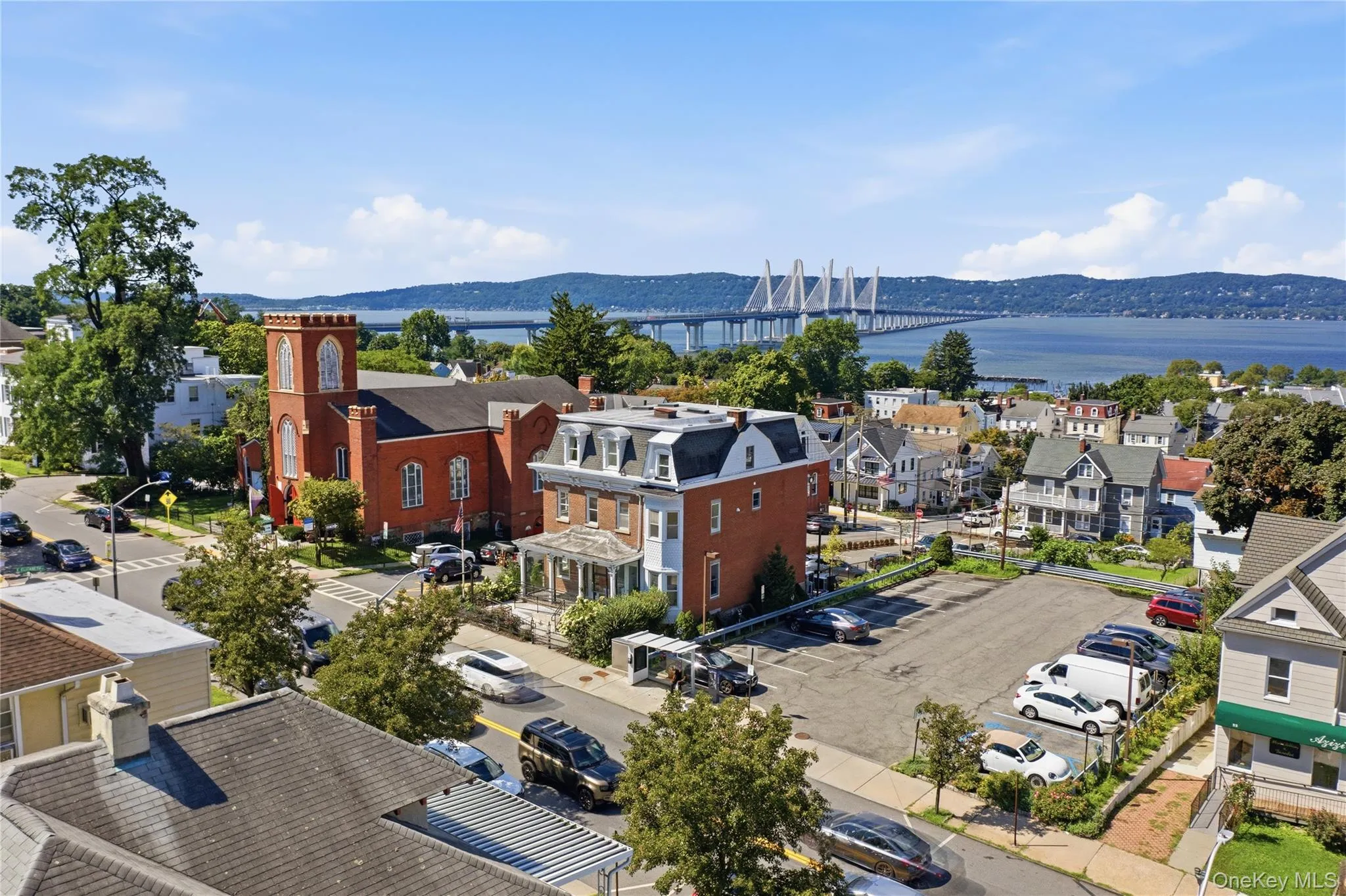 Spectacular Aerial ViewEnjoy a beautiful aerial perspective of Tarrytown, showcasing the surrounding neighborhood with the Hudson River and scenic landscape beyond. The elevated view highlights the property’s exceptional setting and proximity to the village, waterfront, shops, restaurants, parks, and transportation—offering a wonderful combination of historic Tarrytown charm and Hudson Valley living. Spectacular Aerial ViewEnjoy a beautiful aerial perspective of Tarrytown, showcasing the surrounding neighborhood with the Hudson River and scenic landscape beyond. The elevated view highlights the property’s exceptional setting and proximity to the village, waterfront, shops, restaurants, parks, and transportation—offering a wonderful combination of historic Tarrytown charm and Hudson Valley living.