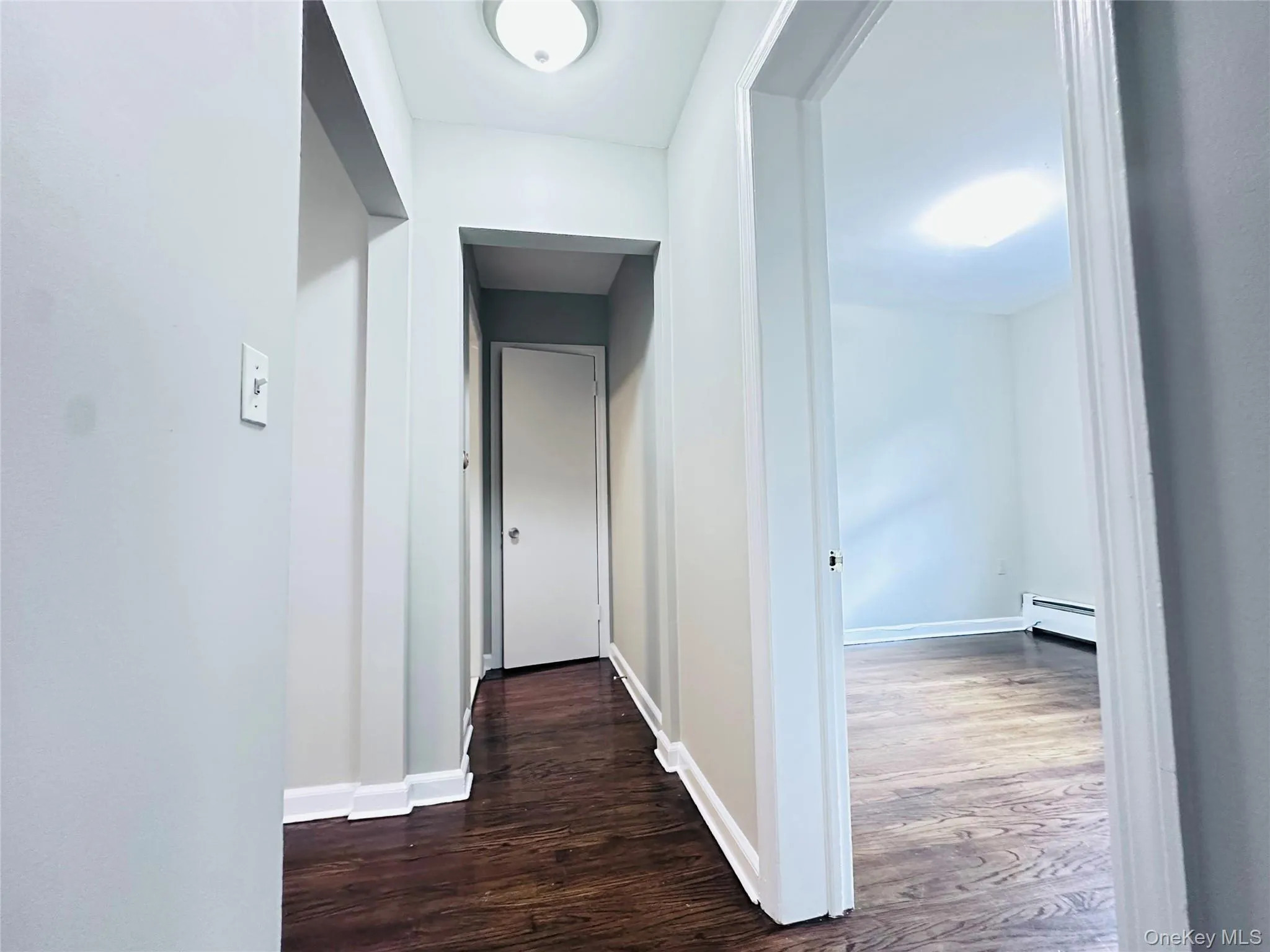 Hardwood flooring throughout, white trim, flush mount ceiling lighting, and fresh painted walls Hardwood flooring throughout, white trim, flush mount ceiling lighting, and fresh painted walls