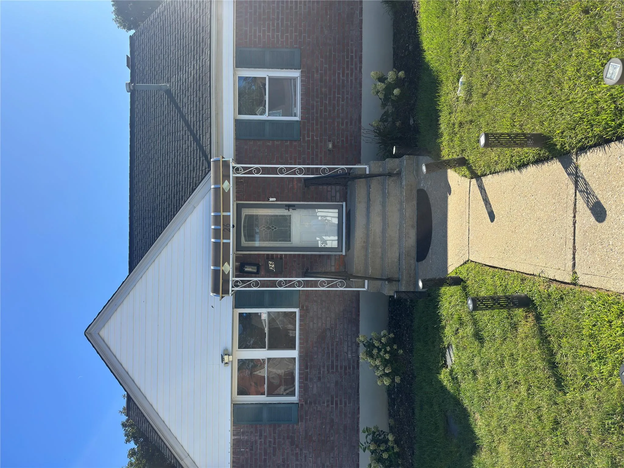 Brick exterior with white siding gable Brick exterior with white siding gable