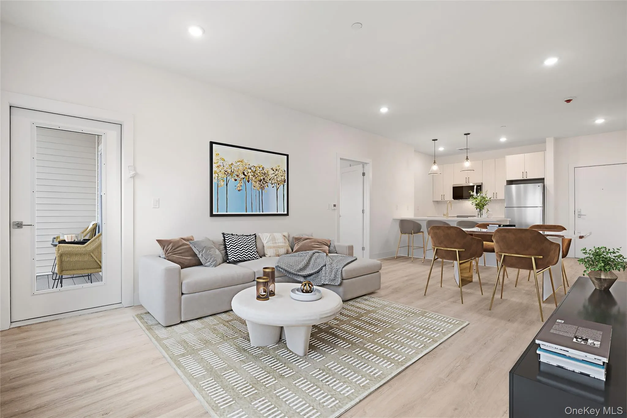 Living room with light hardwood / wood-style flooring Living room with light hardwood / wood-style flooring