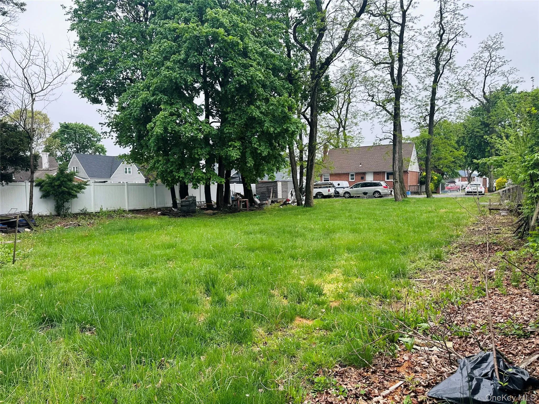 View of yard featuring fence View of yard featuring fence
