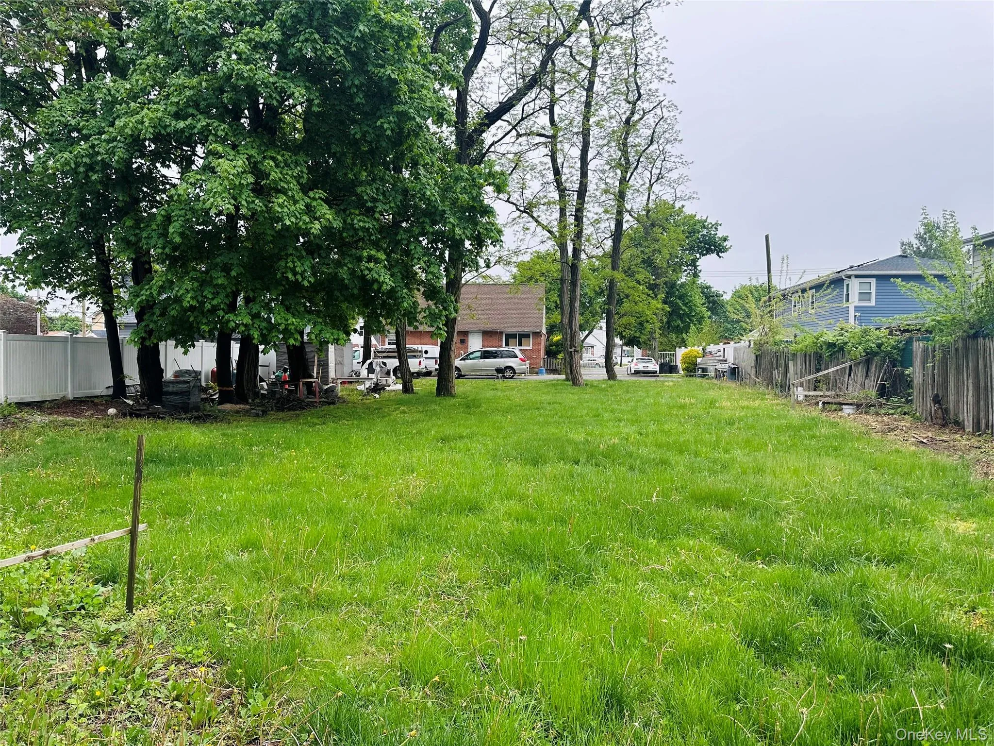View of yard with fence View of yard with fence
