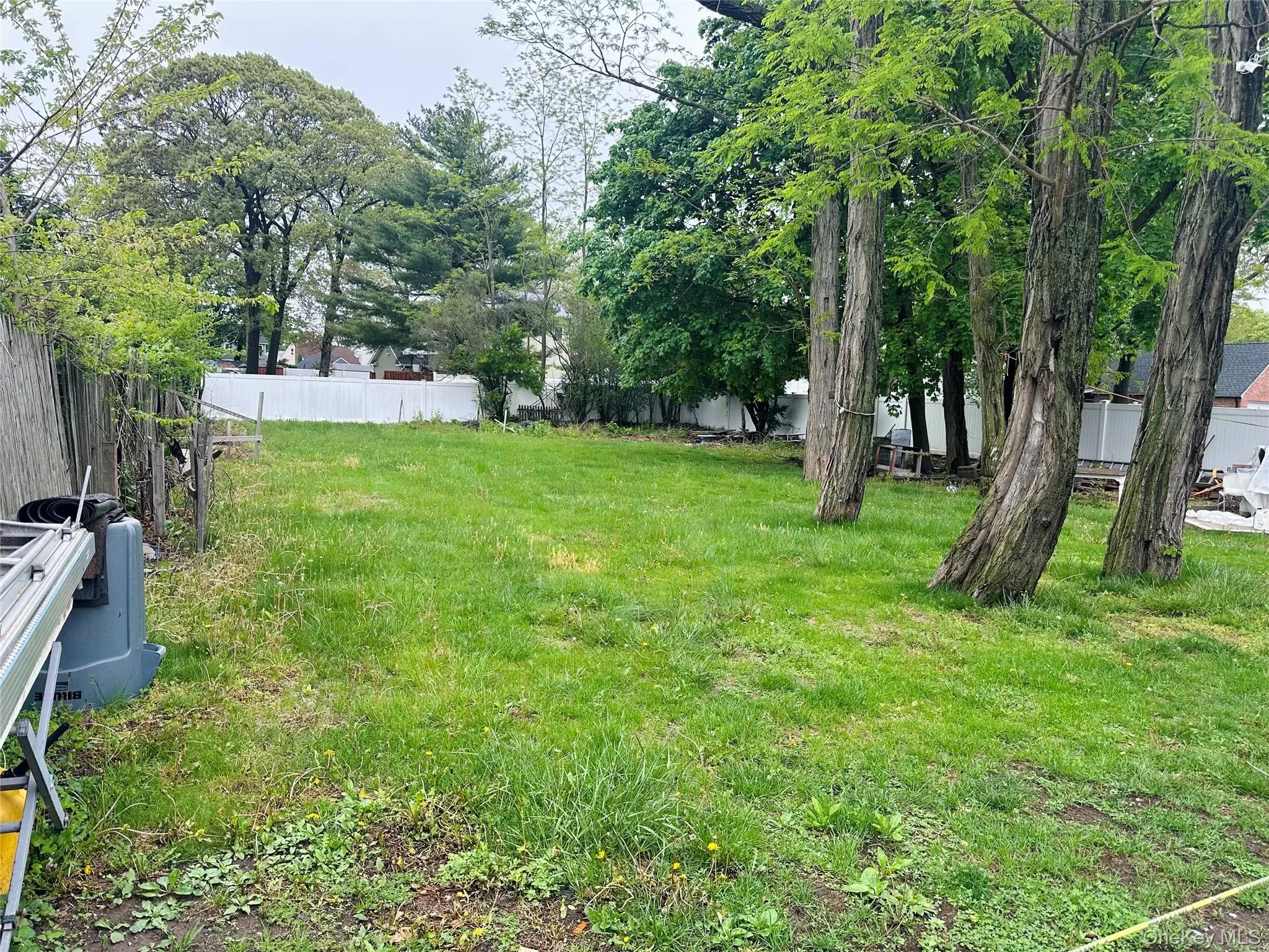 View of yard featuring fence View of yard featuring fence