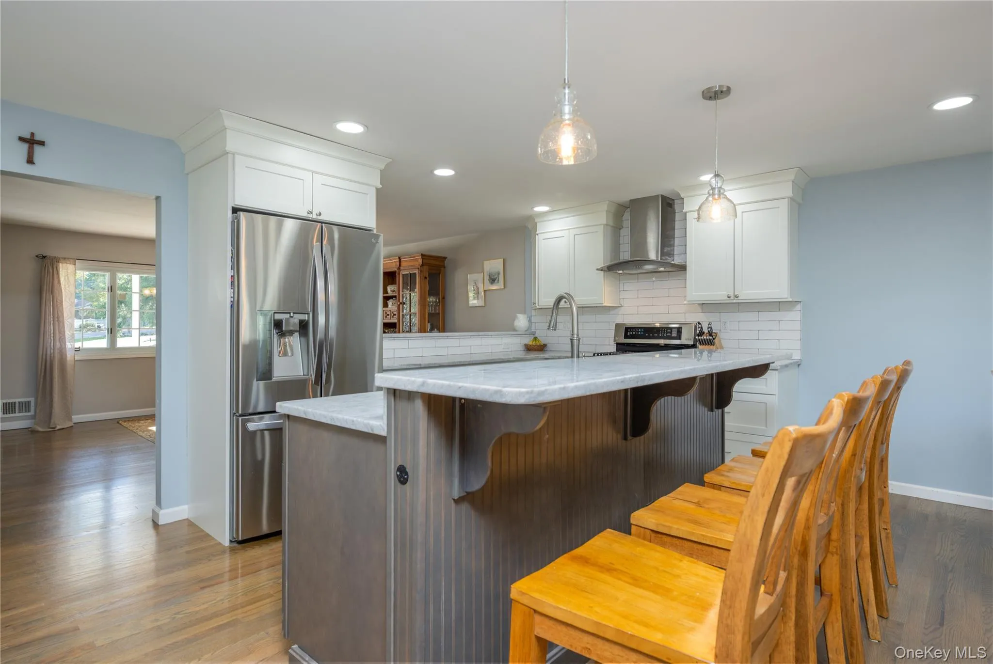 Open eat-in kitchen with island seating Open eat-in kitchen with island seating