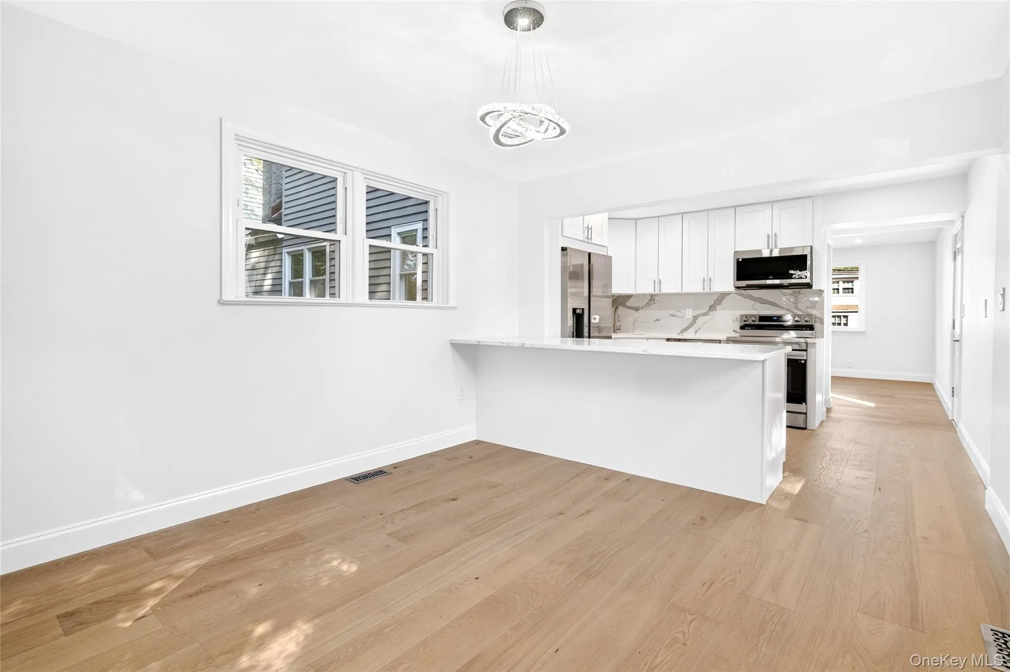 Kitchen with formal dining room Kitchen with formal dining room
