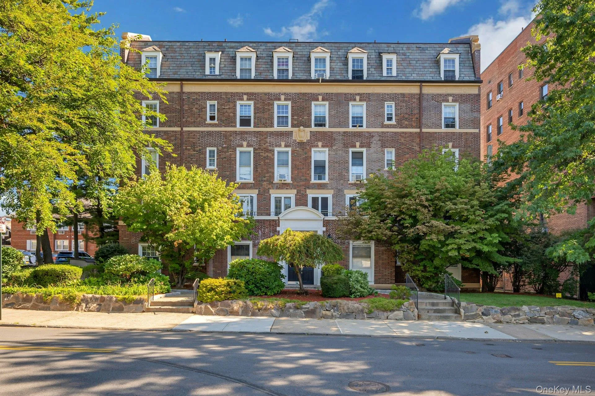 208 Centra Ave Building- Colonial/Georgian Revival Building with a mansard roof 208 Centra Ave Building- Colonial/Georgian Revival Building with a mansard roof