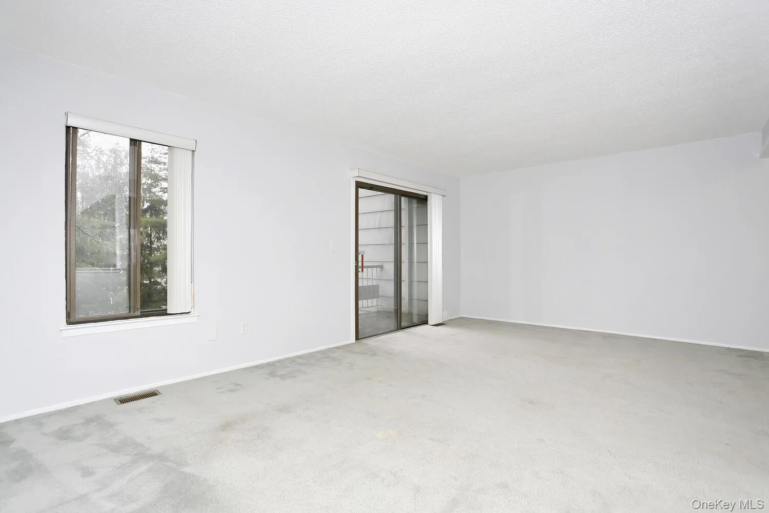 The carpeting has been replace with laminate flooring. The carpeting has been replace with laminate flooring.