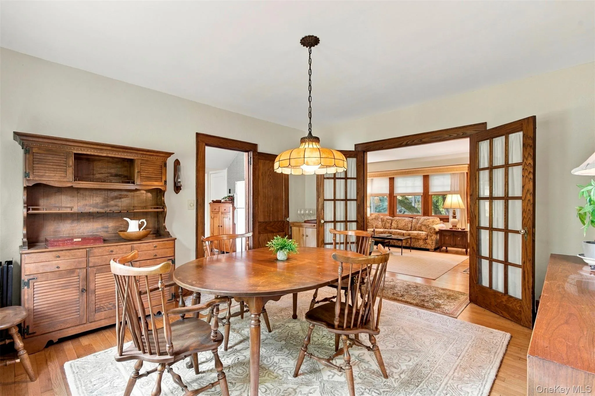 French Doors lead from the Dining Room to the Living Room. French Doors lead from the Dining Room to the Living Room.
