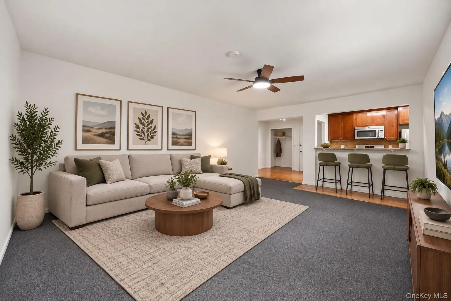Virtually staged living/dining room with breakfast bar. Virtually staged living/dining room with breakfast bar.