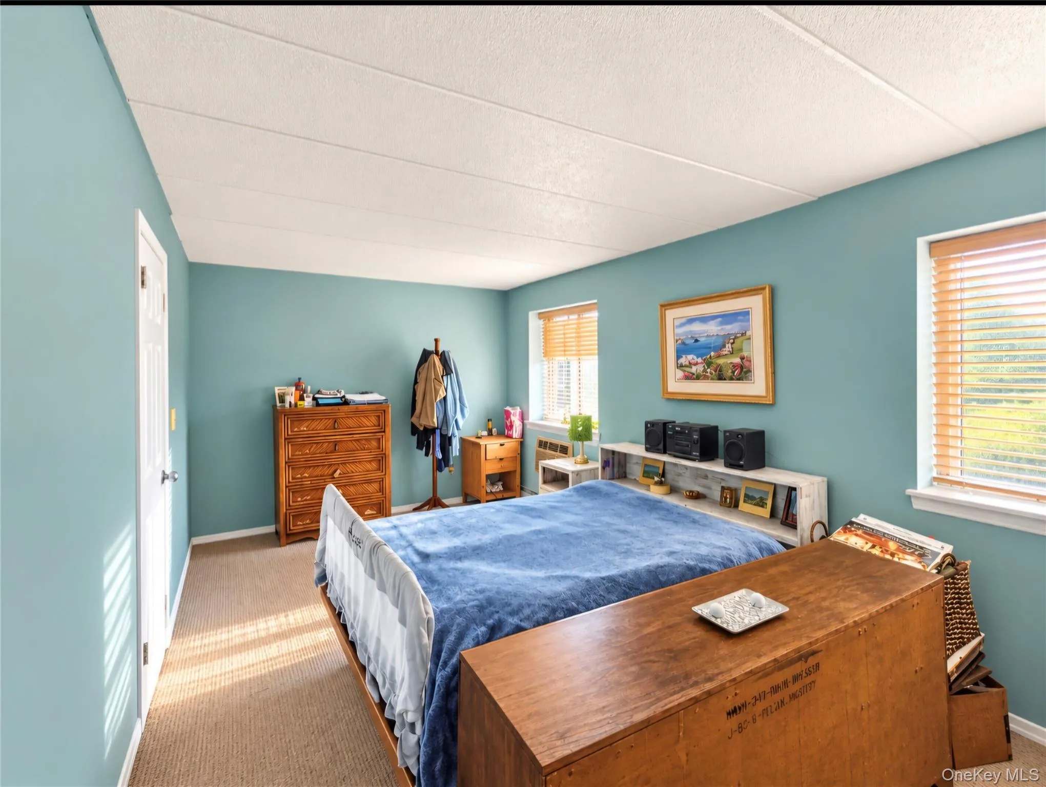 Primary bedroom has a full bath. Wall-to-wall carpeting and neutral wall color Primary bedroom has a full bath. Wall-to-wall carpeting and neutral wall color