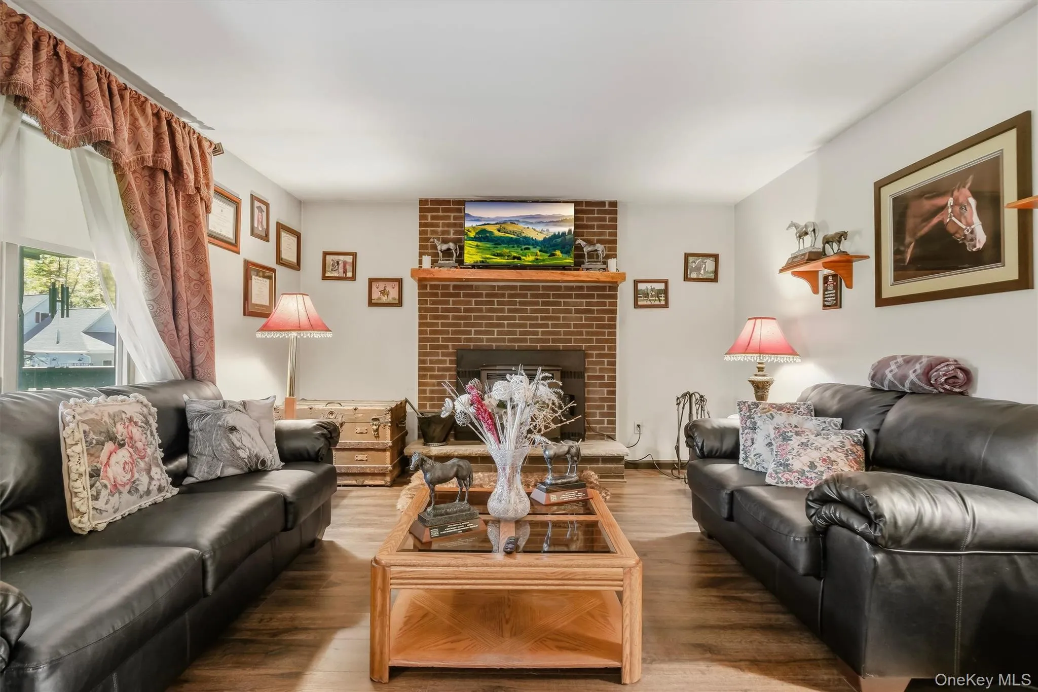 Bringing warmth to the living room is a brick backed pellet stove. Bringing warmth to the living room is a brick backed pellet stove.