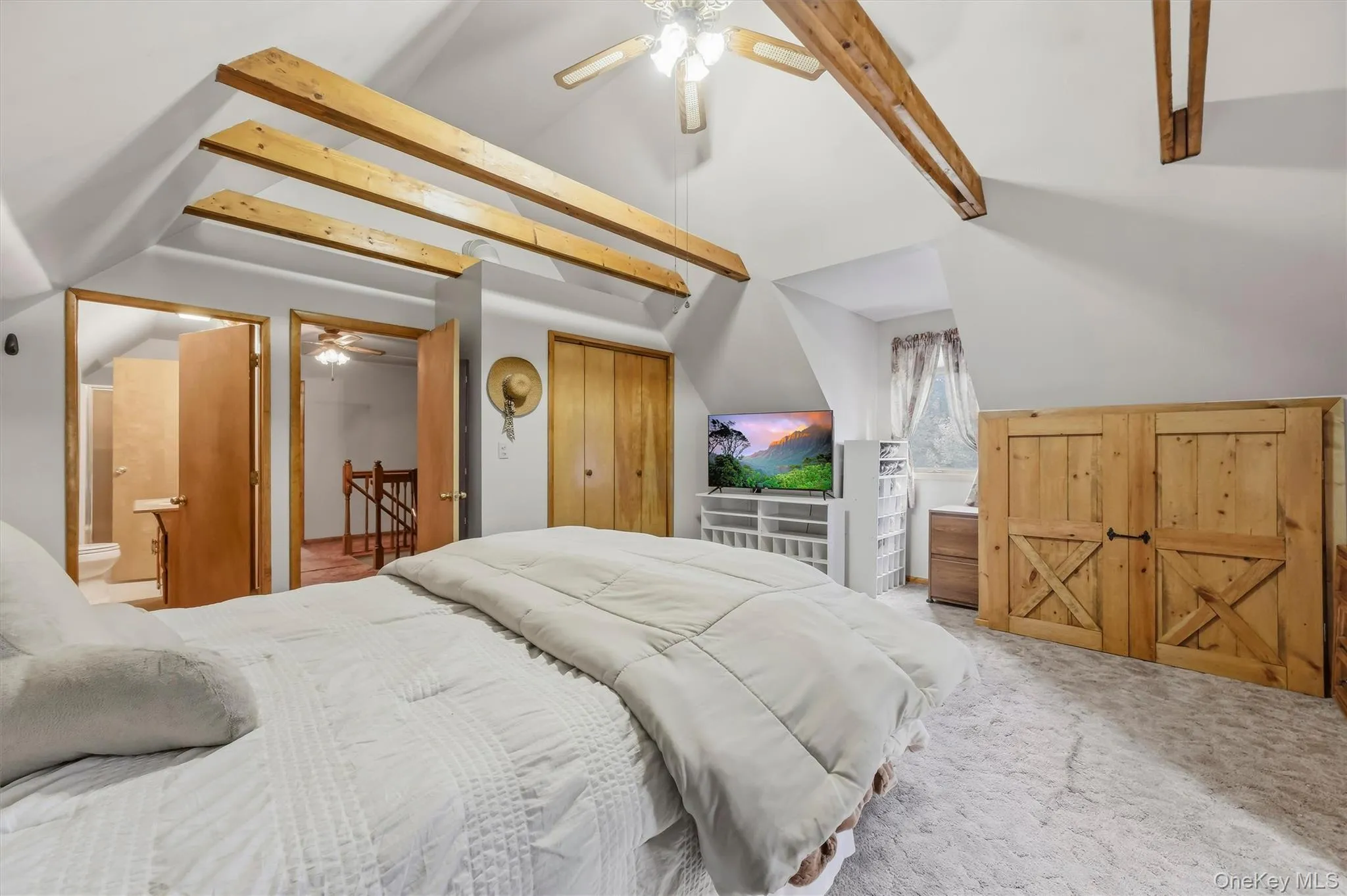 You'll want to spend your Sunday mornings wrapped up in the quiet of the primary bedroom. You'll want to spend your Sunday mornings wrapped up in the quiet of the primary bedroom.