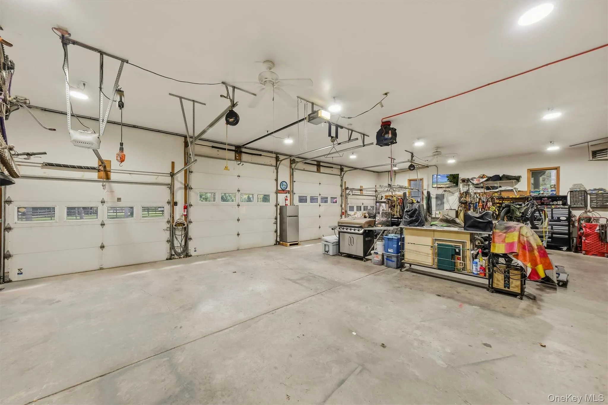 The 5 bay garage has 3 12' doors, making having a mechanic's shop or RV storage a reality. The 5 bay garage has 3 12' doors, making having a mechanic's shop or RV storage a reality.