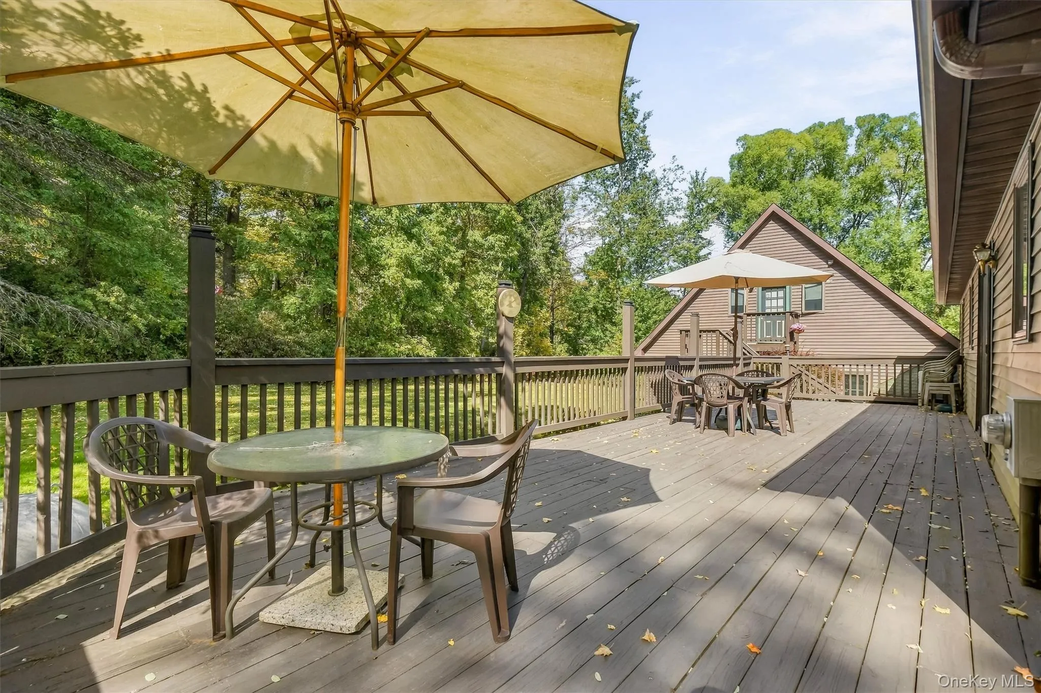 The spacious wraparound back deck is an inviting place to grill dinner and linger over dessert on long summer evenings. The spacious wraparound back deck is an inviting place to grill dinner and linger over dessert on long summer evenings.