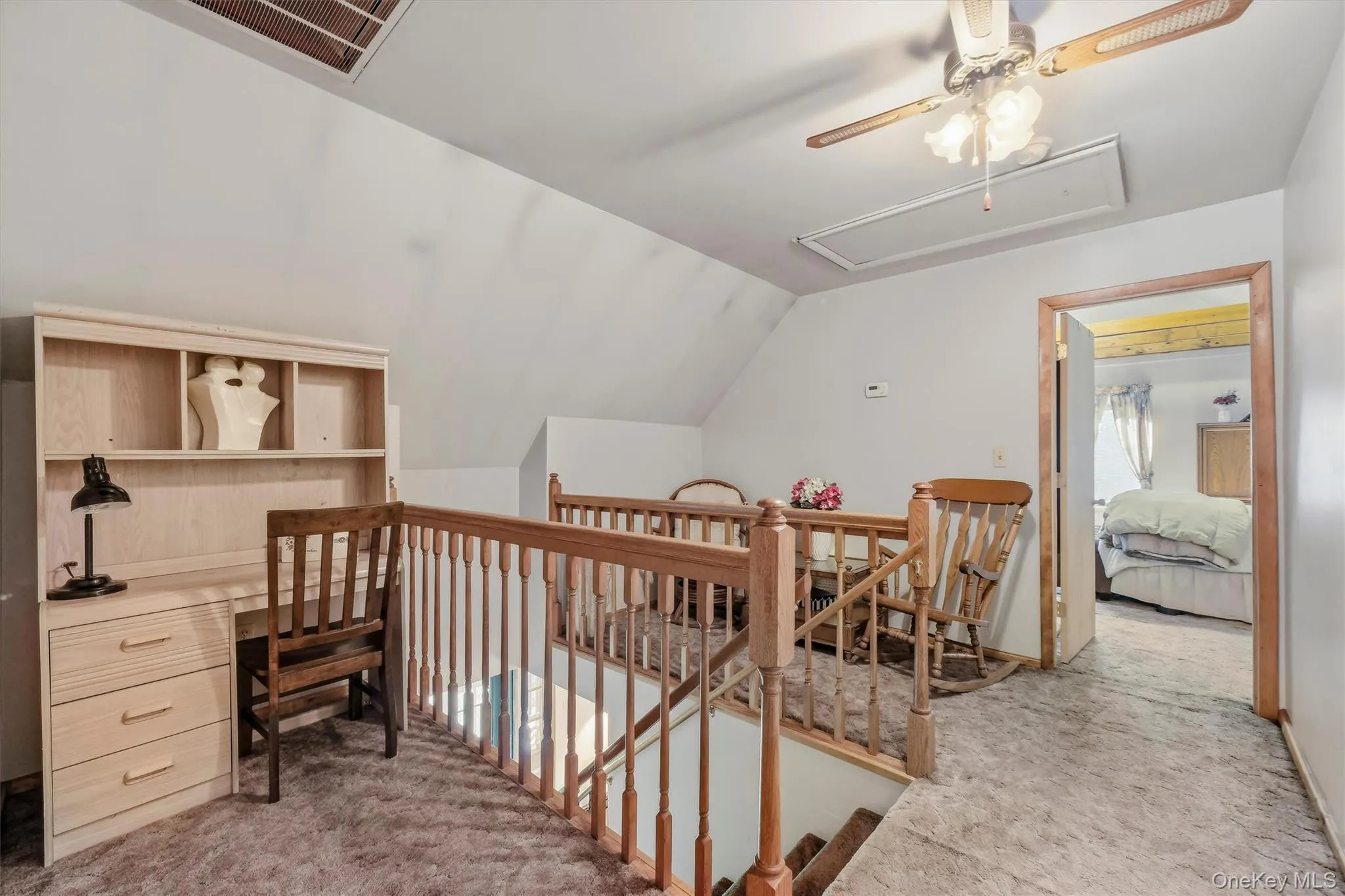 The landing on the second floor, with center ceiling fan, has areas that could be used as a reading nook, homework area or play area! The landing on the second floor, with center ceiling fan, has areas that could be used as a reading nook, homework area or play area!