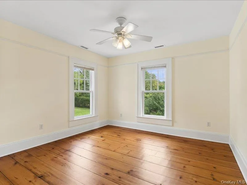Upstairs Bedroom with Hardwood Floors Upstairs Bedroom with Hardwood Floors