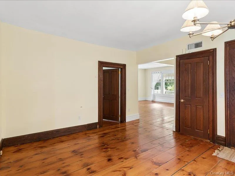 Dining Room Opens to Living Room and Ensuite Bedroom Dining Room Opens to Living Room and Ensuite Bedroom