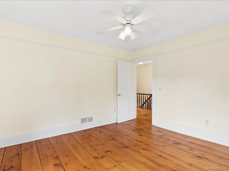 Upstairs Bedroom with Hardwood Floors Upstairs Bedroom with Hardwood Floors
