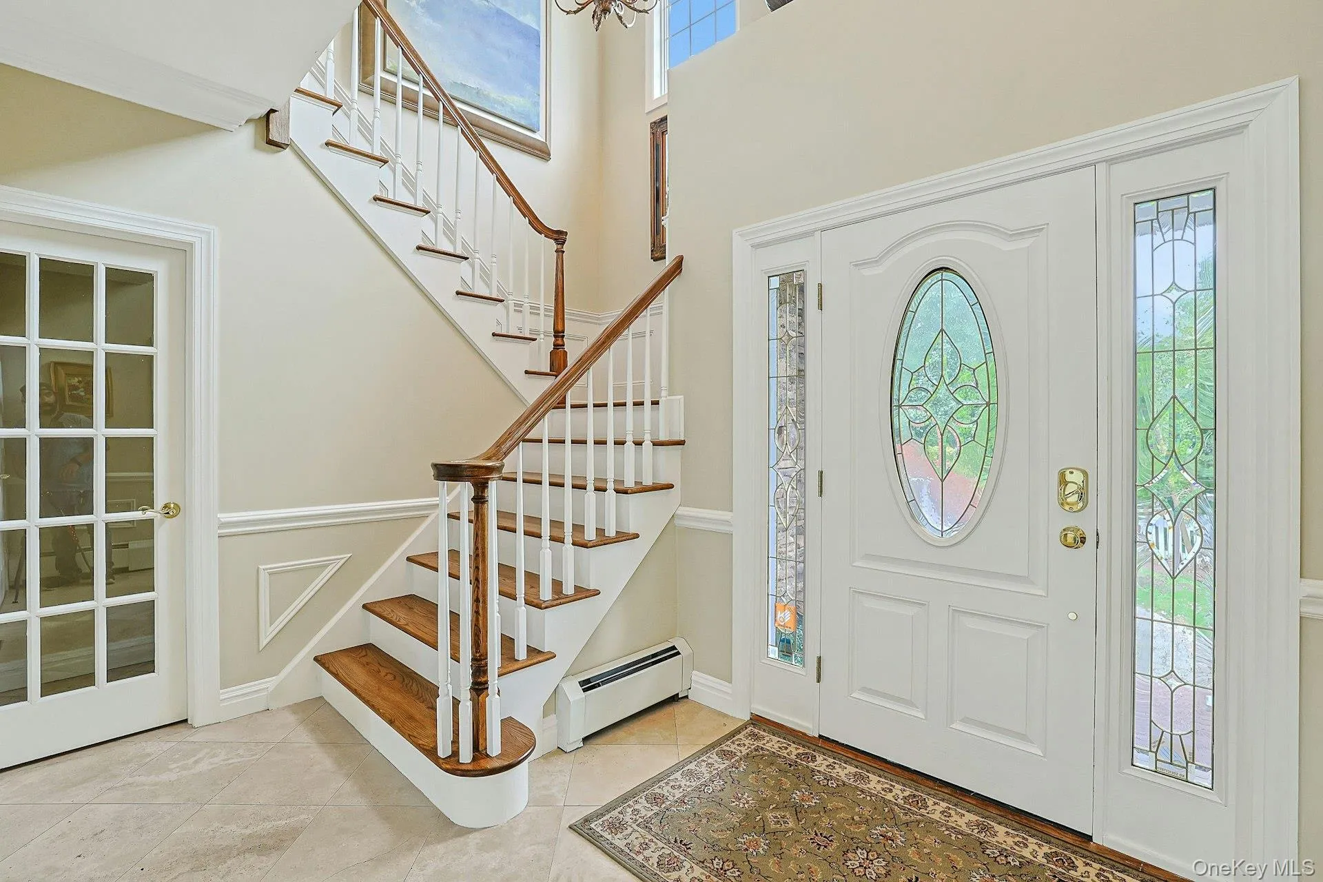 Elegant Two-Story Entry W/Porcelanonsa, Imported Travertine Crema-Marfil Natural Stone Throughout Elegant Two-Story Entry W/Porcelanonsa, Imported Travertine Crema-Marfil Natural Stone Throughout