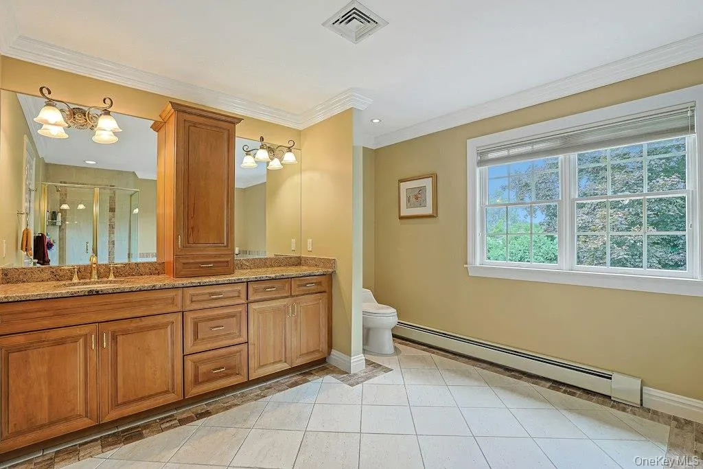 Elegant Primary Bath W/Porcelanonsa Imported Designer Tile, Maple Cabinetry W/Glaze Elegant Primary Bath W/Porcelanonsa Imported Designer Tile, Maple Cabinetry W/Glaze