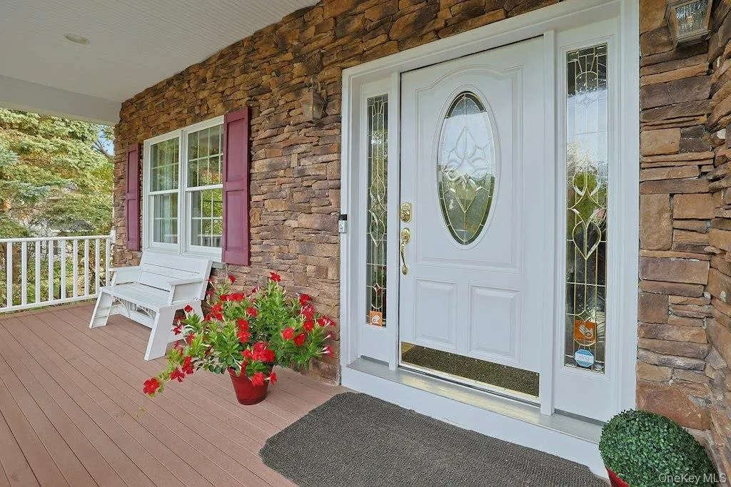 Covered Front Porch W/Colums Cultured Stone Elevation - Your Package Won't Get Wet Covered Front Porch W/Colums Cultured Stone Elevation - Your Package Won't Get Wet