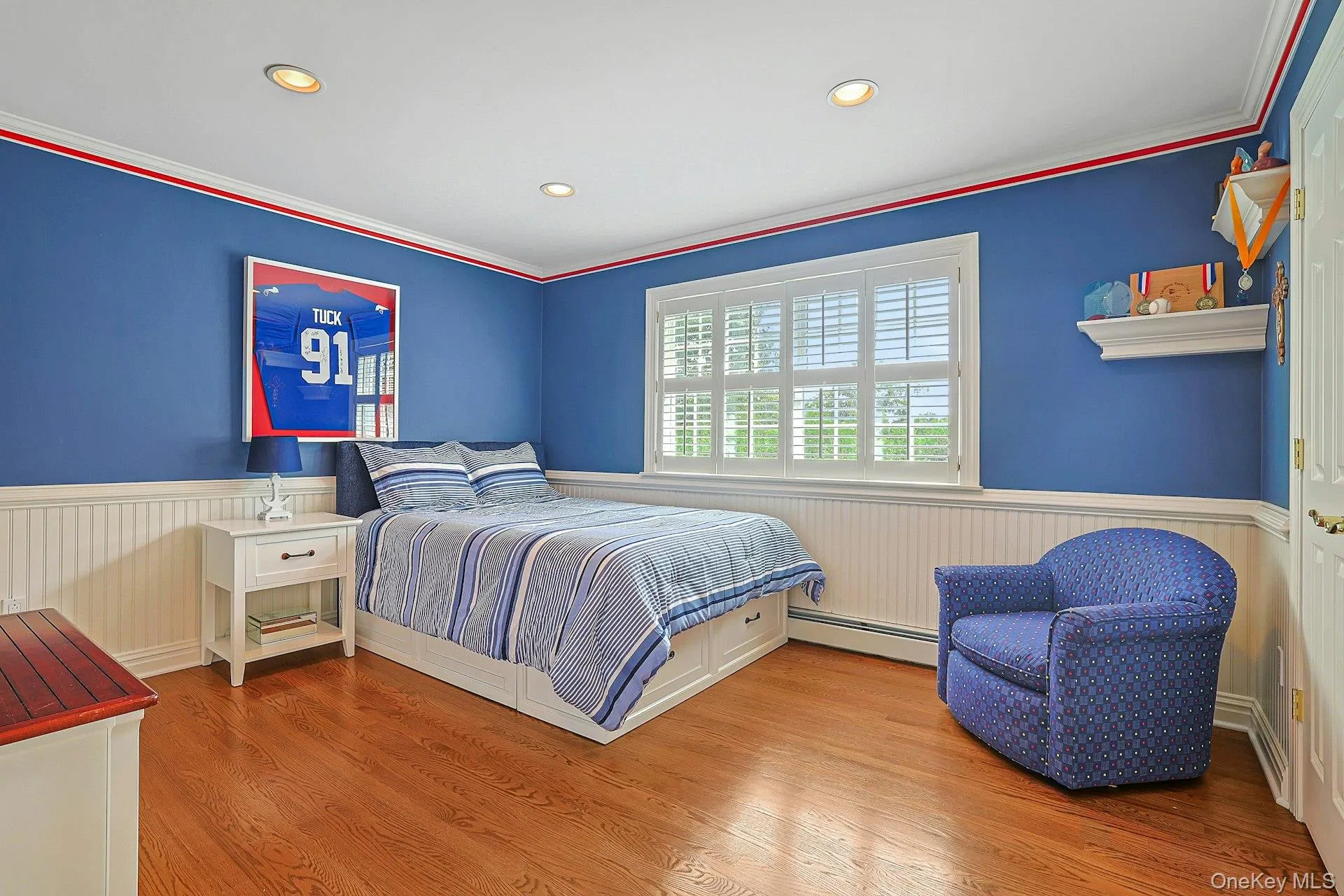 Spacious Bedroom W, Enlarged Crown Mouldings, Wainscoting, Hardwood Flooring, Oversized Closets Spacious Bedroom W, Enlarged Crown Mouldings, Wainscoting, Hardwood Flooring, Oversized Closets