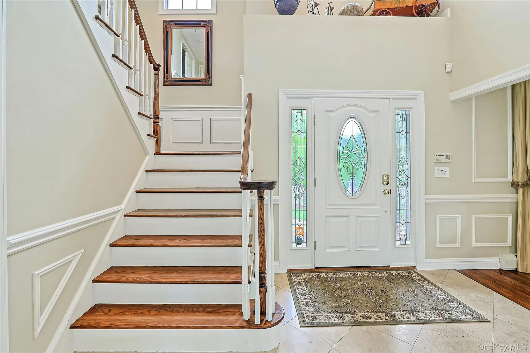 Elegant Two-Story Entry W/Porcelanonsa, Imported Travertine Crema-Marfil Natural Stone Throughout Elegant Two-Story Entry W/Porcelanonsa, Imported Travertine Crema-Marfil Natural Stone Throughout